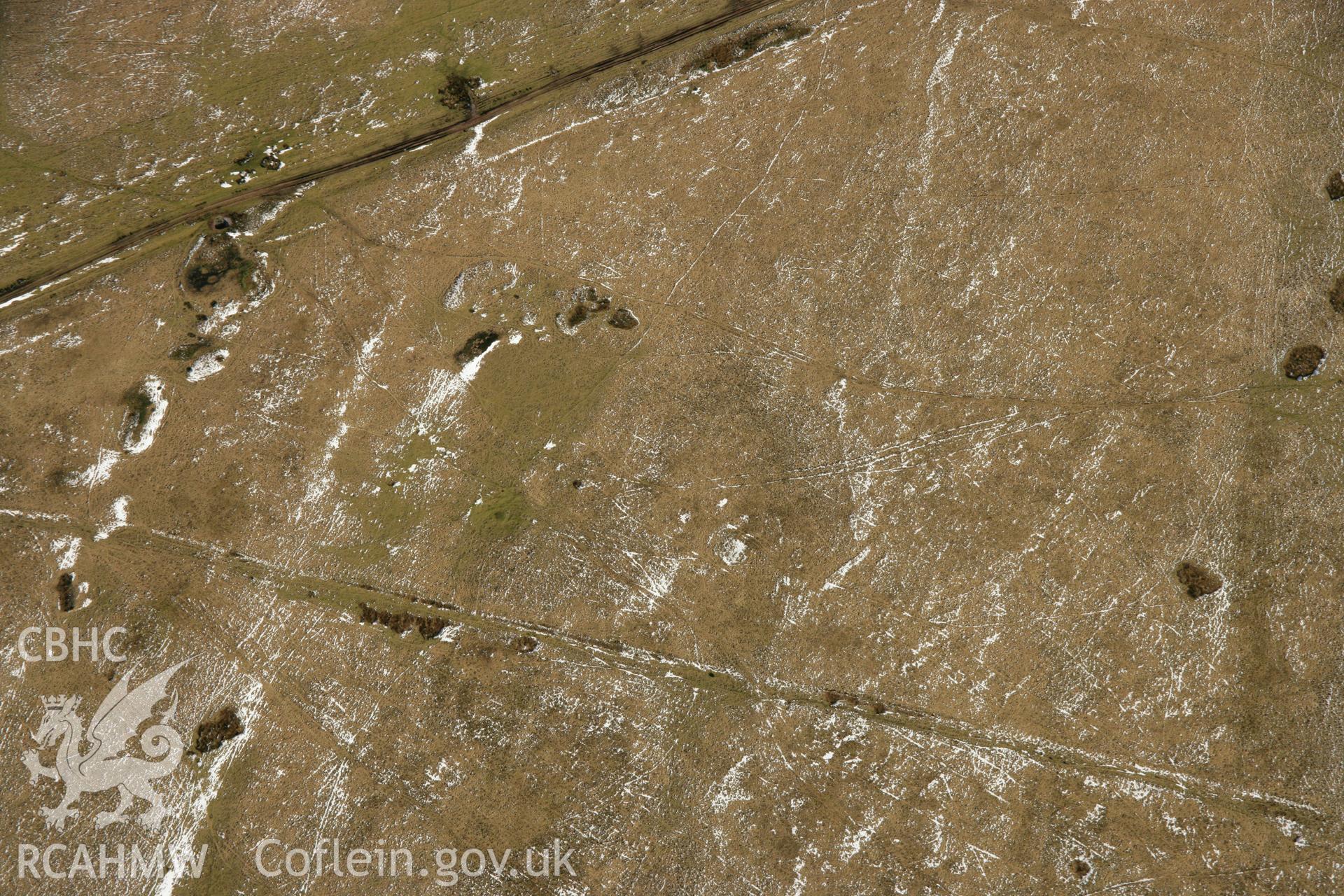 RCAHMW colour oblique aerial photograph of Y Pigwn Cairn II,  Mynydd Bach Trecastell. Taken on 21 March 2007 by Toby Driver