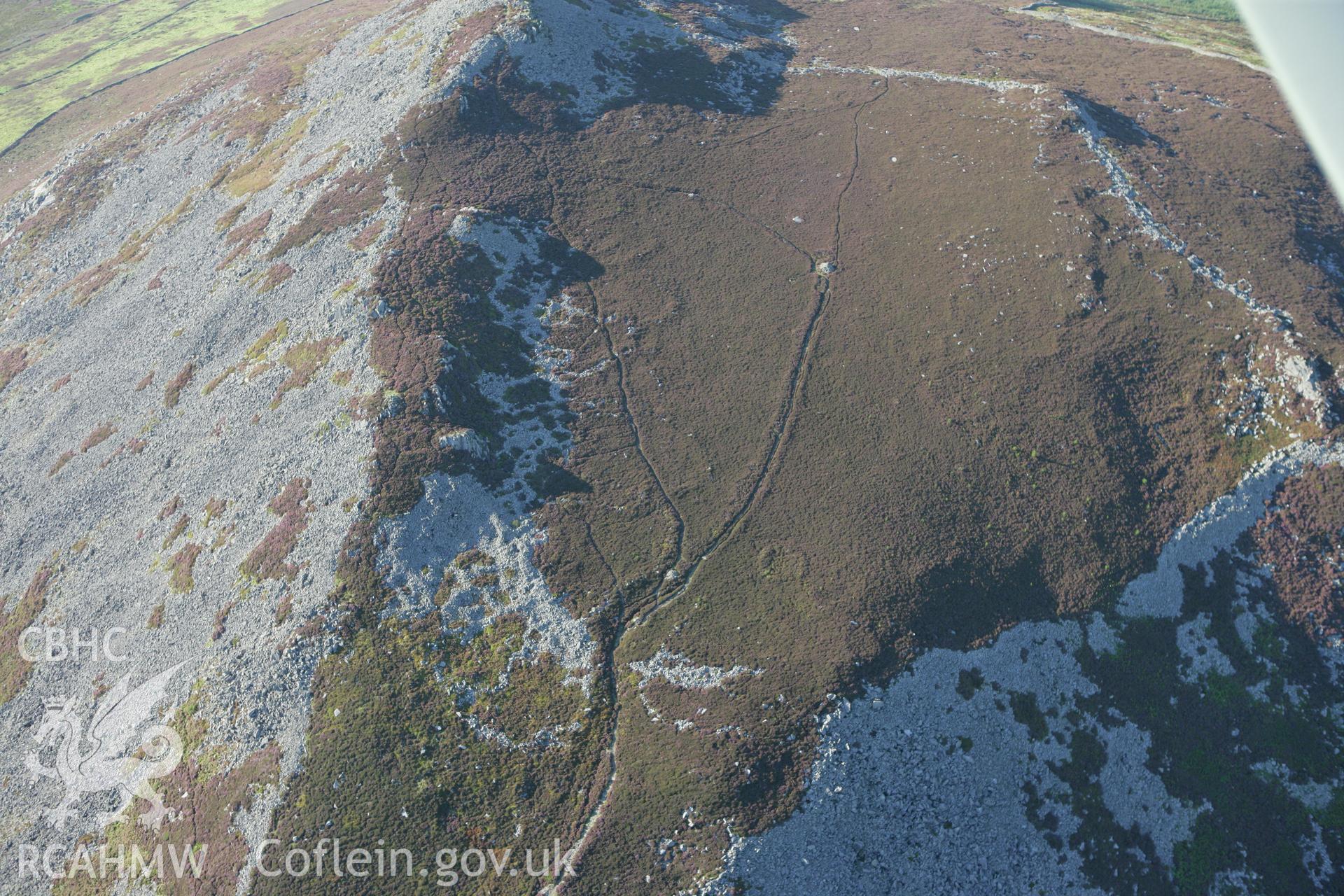 RCAHMW colour oblique aerial photograph of Carn Fadrun. Taken on 06 September 2007 by Toby Driver