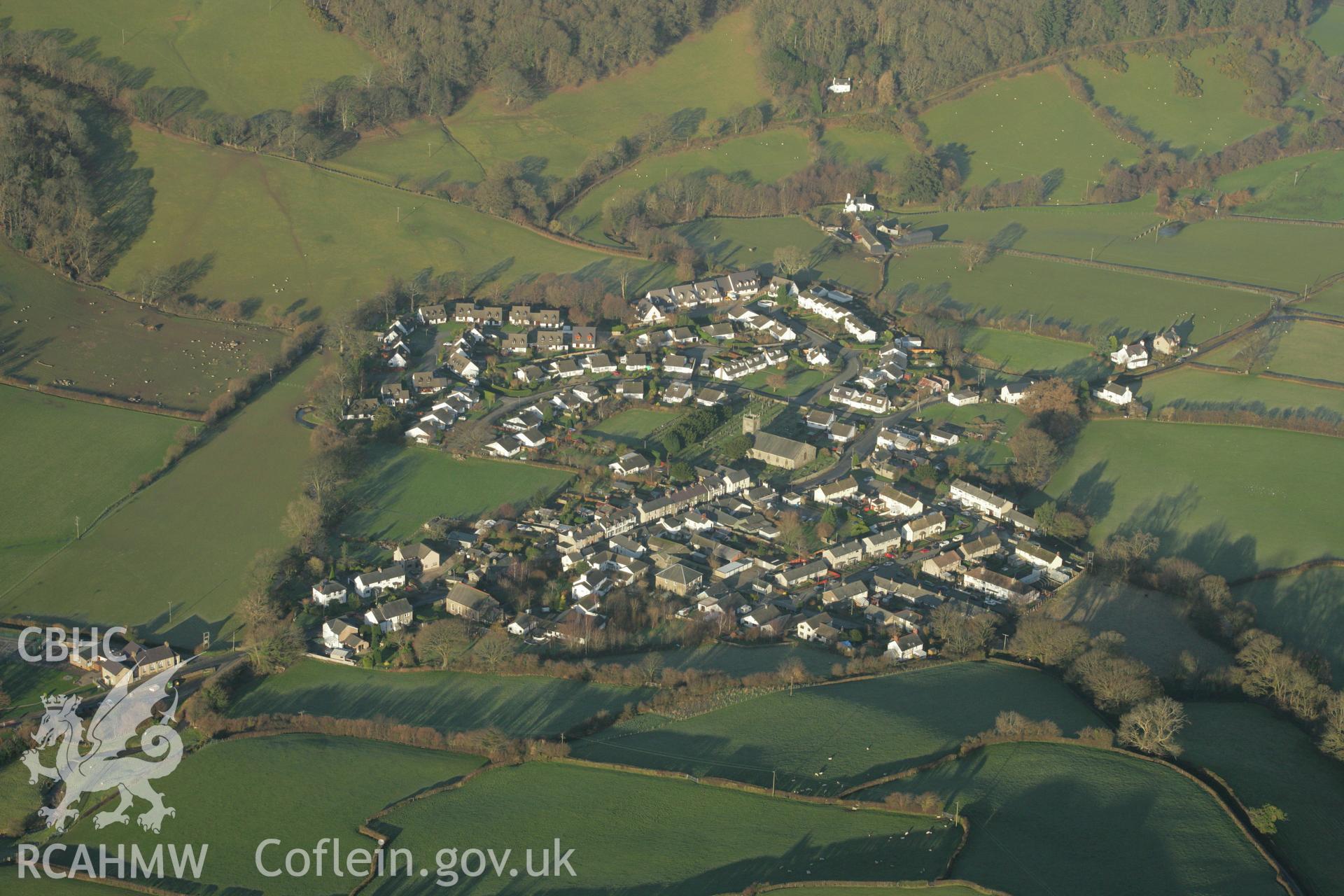 RCAHMW colour oblique aerial photograph of the landscape around Eglwysbach Village. Taken on 25 January 2007 by Toby Driver