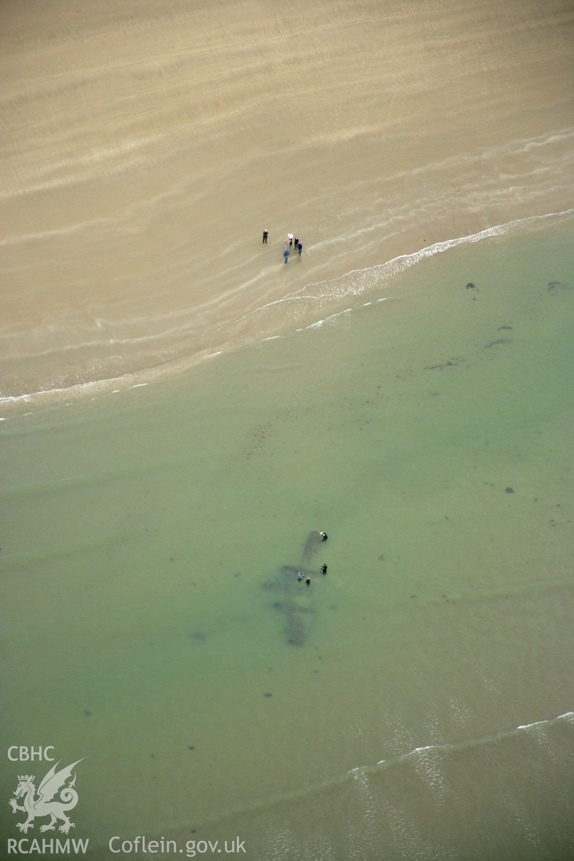 RCAHMW colour oblique photograph of P-38 Lightning, aircraft wreck at low tide. Taken by Toby Driver on 08/10/2007.