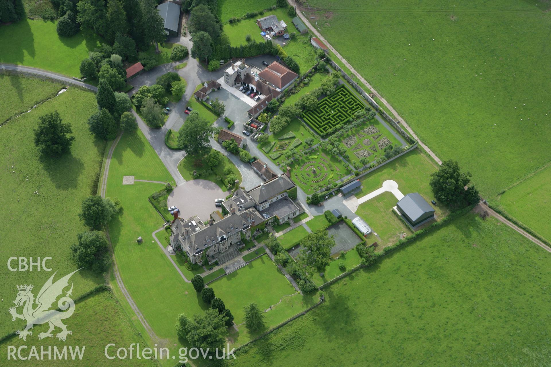 RCAHMW colour oblique aerial photograph of Llangoed Hall. Taken on 09 July 2007 by Toby Driver