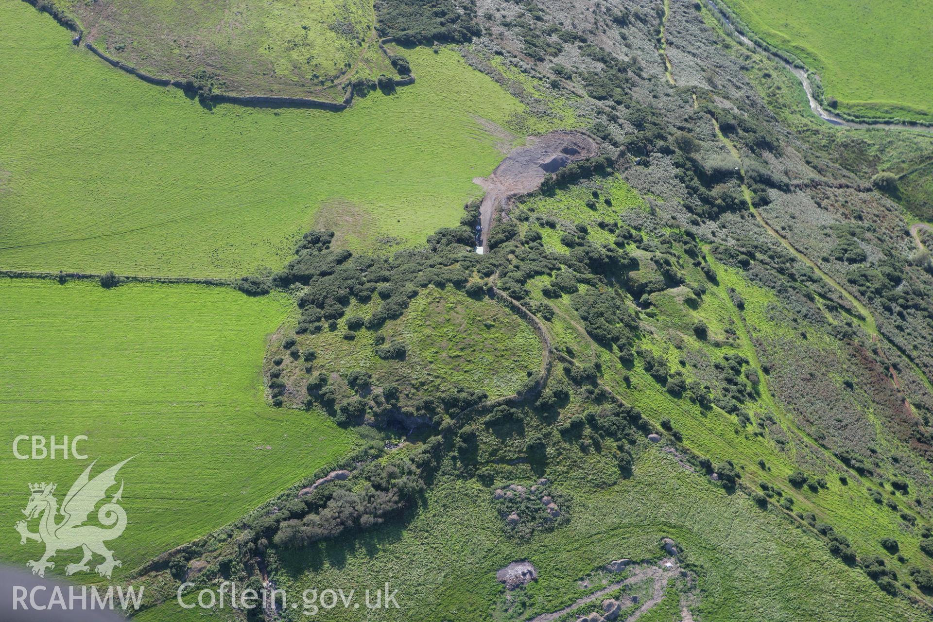 RCAHMW colour oblique aerial photograph of Pen-y-Gaer Defended Hillfort Enclosure. Taken on 06 September 2007 by Toby Driver