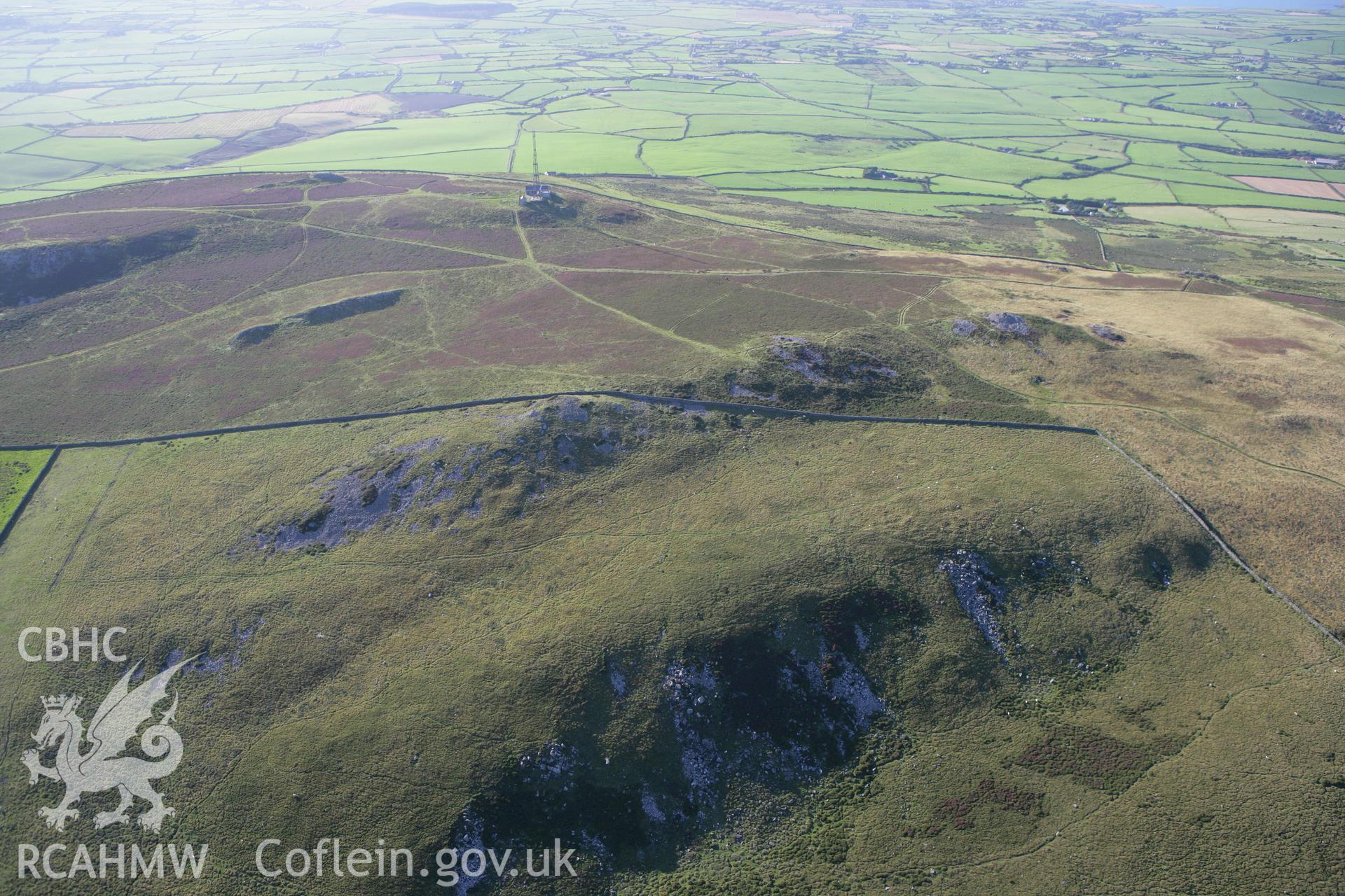 RCAHMW colour oblique aerial photograph of Mynydd Rhiw Cairn I. Taken on 06 September 2007 by Toby Driver