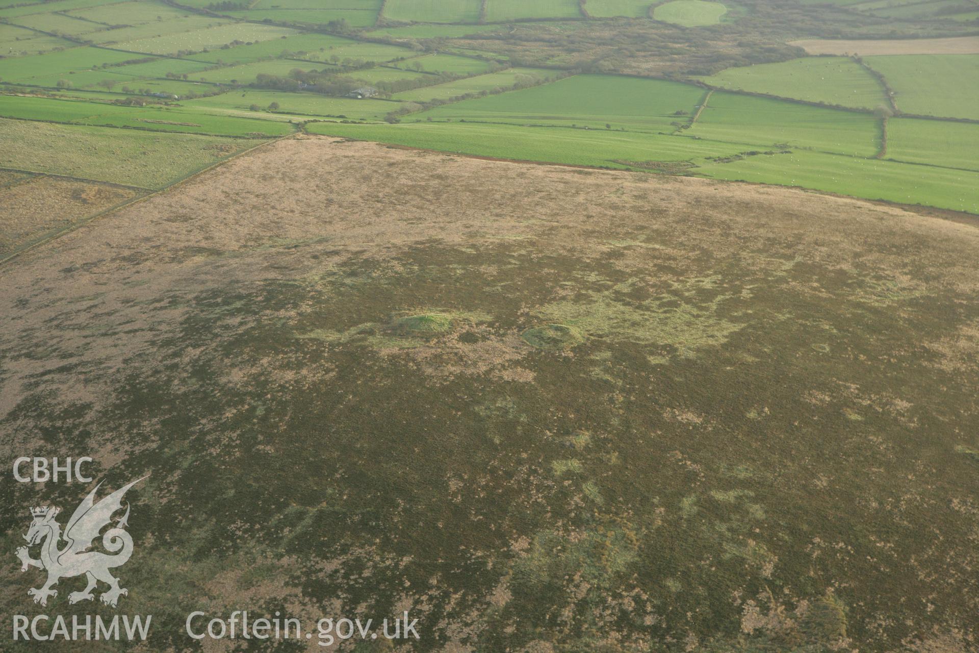 RCAHMW colour oblique photograph of Mynydd Castleblyth cairn I;Mynydd Castleblyth cairn II;Mynydd Castleblyth ring barrow. Taken by Toby Driver on 06/11/2007.