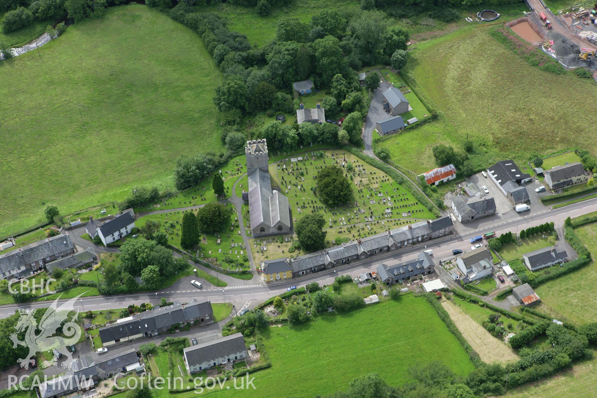 RCAHMW colour oblique aerial photograph of St Cynog's Church, Defynnog. Taken on 09 July 2007 by Toby Driver