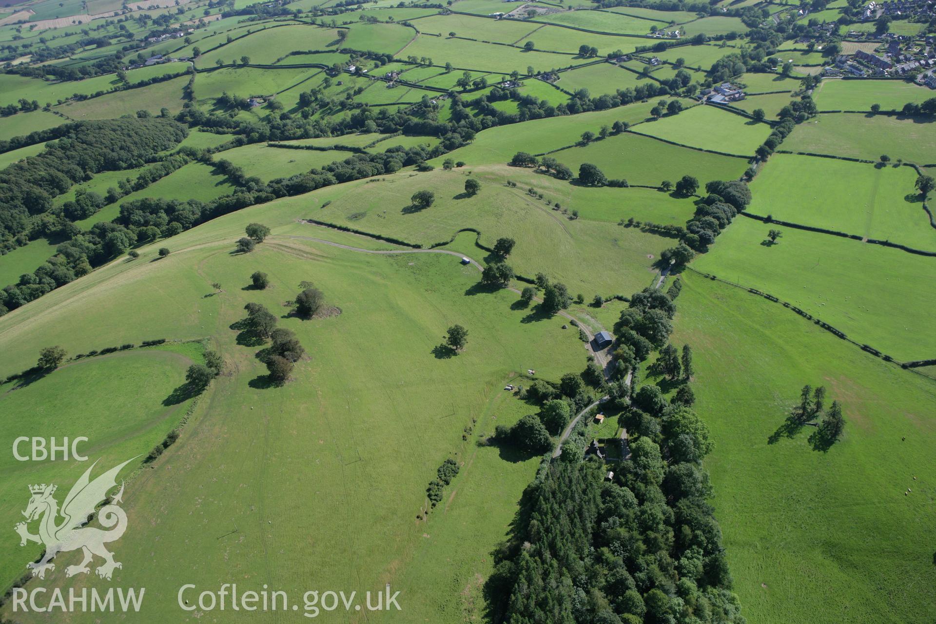 RCAHMW colour oblique aerial photograph of a section of Offa's Dyke from North Lodge, Leighton, to Old Quarry south of Green Wood. Taken on 06 September 2007 by Toby Driver