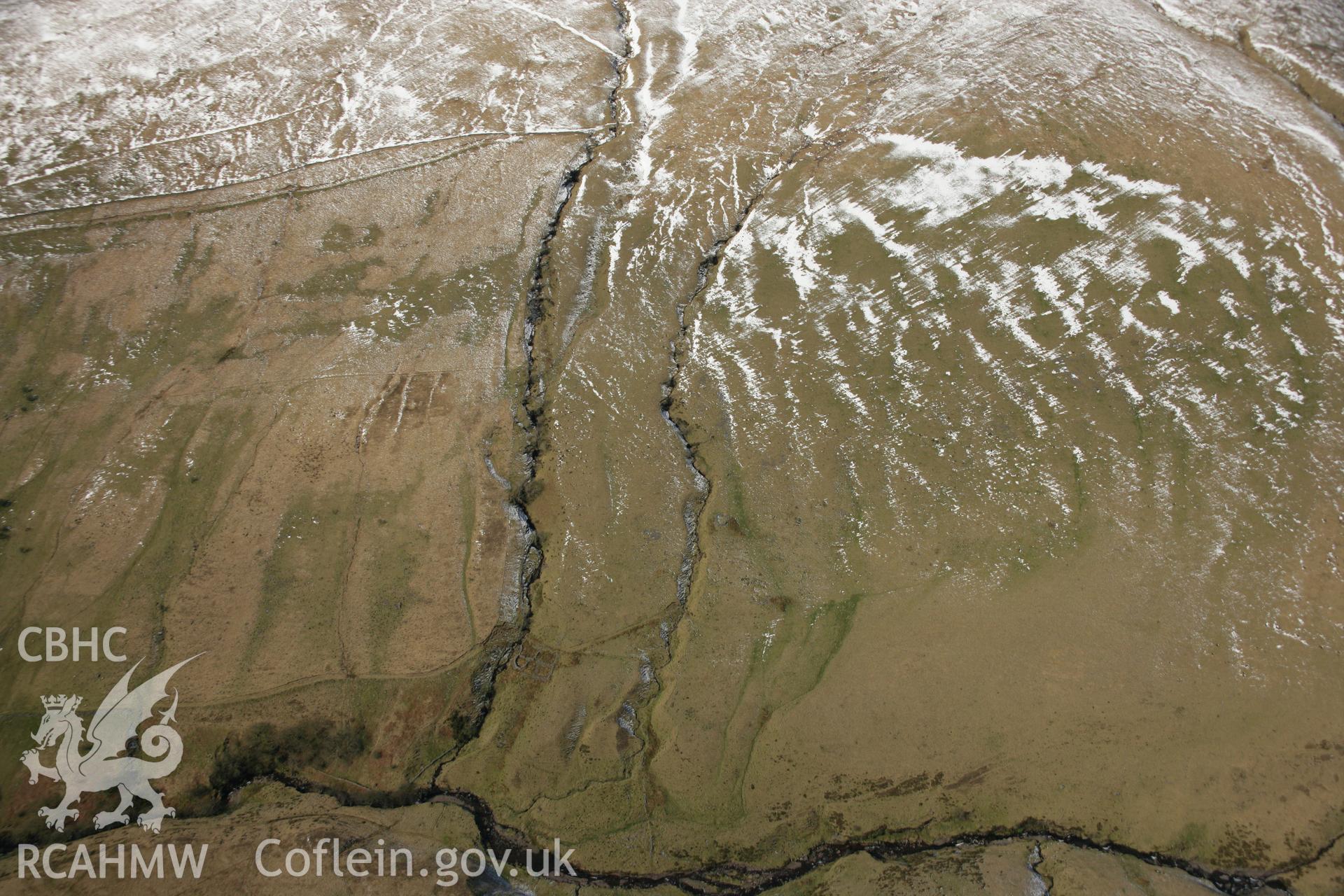 RCAHMW colour oblique aerial photograph of Coetgae Platform Settlement, Glyntawe. Taken on 21 March 2007 by Toby Driver