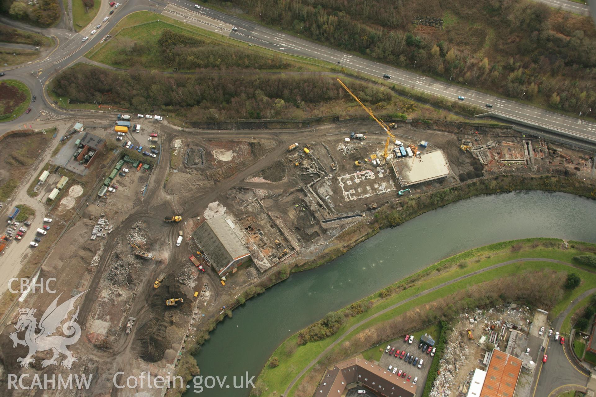 RCAHMW colour oblique aerial photograph of Upper Bank Copperworks, Swansea, showing excavations. Taken on 16 March 2007 by Toby Driver