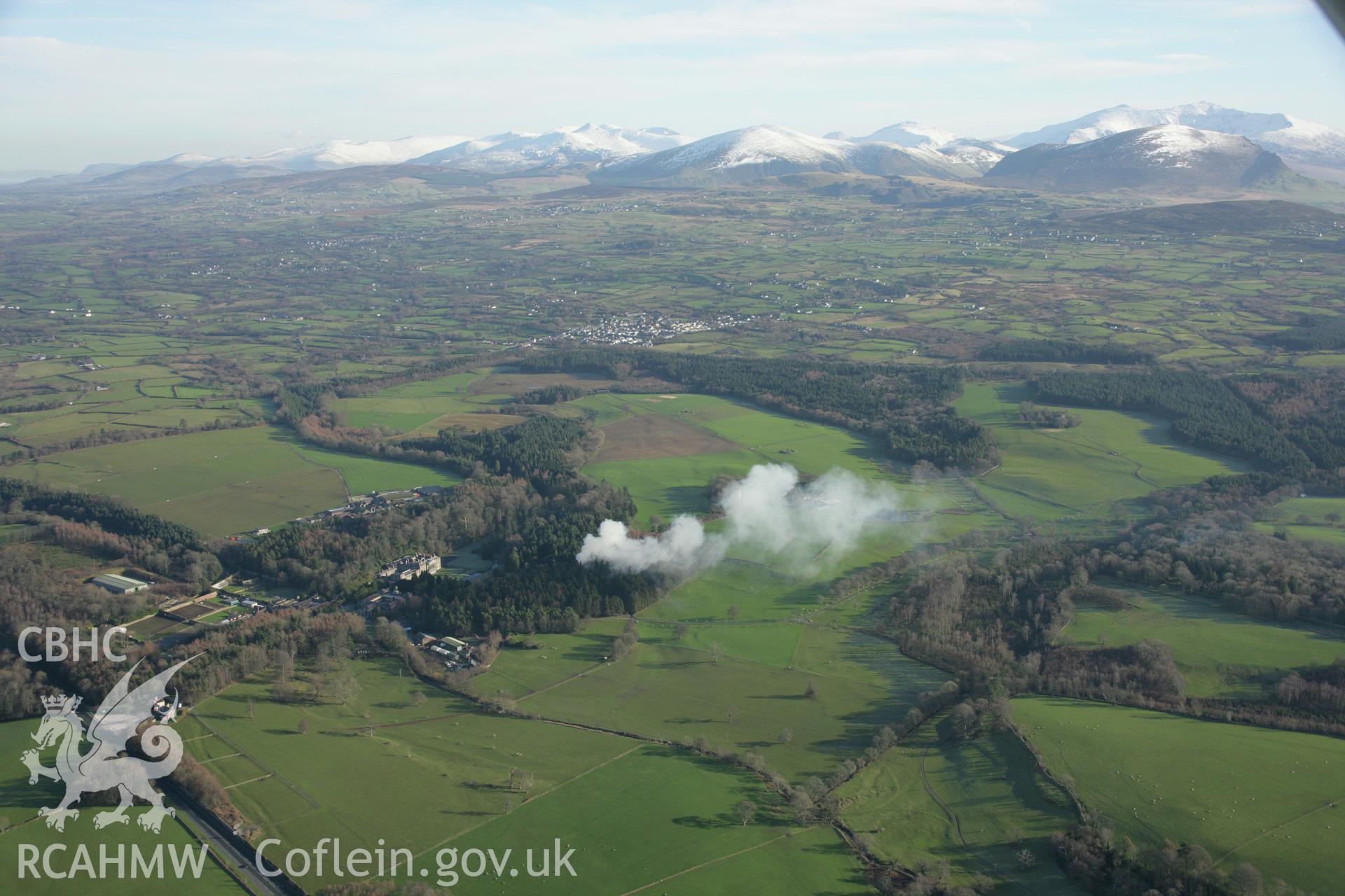 RCAHMW colour oblique aerial photograph of Glynllifon Park, Grounds and Gardens. Taken on 25 January 2007 by Toby Driver