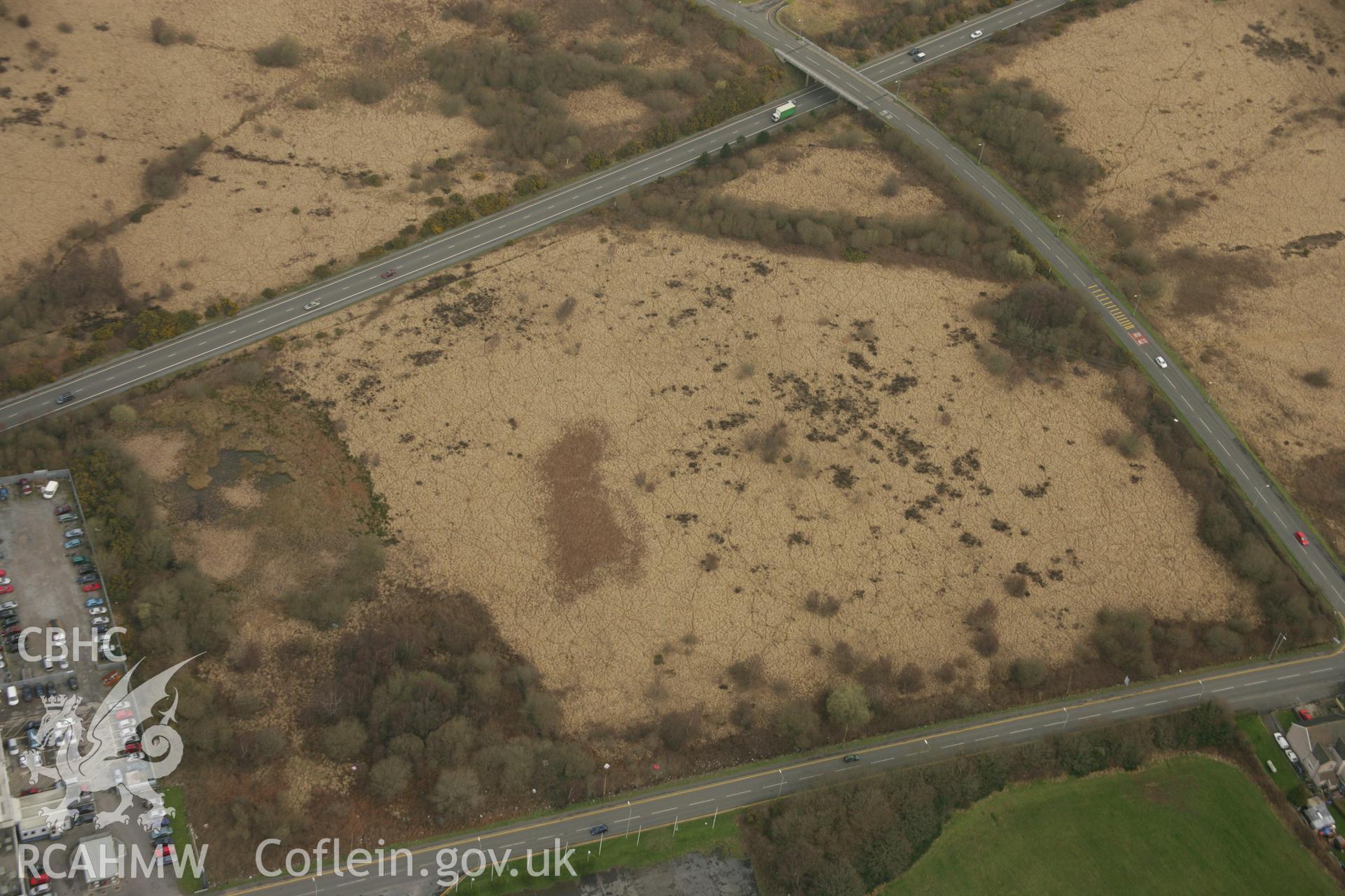 RCAHMW colour oblique aerial photograph of Mynydd Carn Goch, Roman Camp I. Taken on 16 March 2007 by Toby Driver