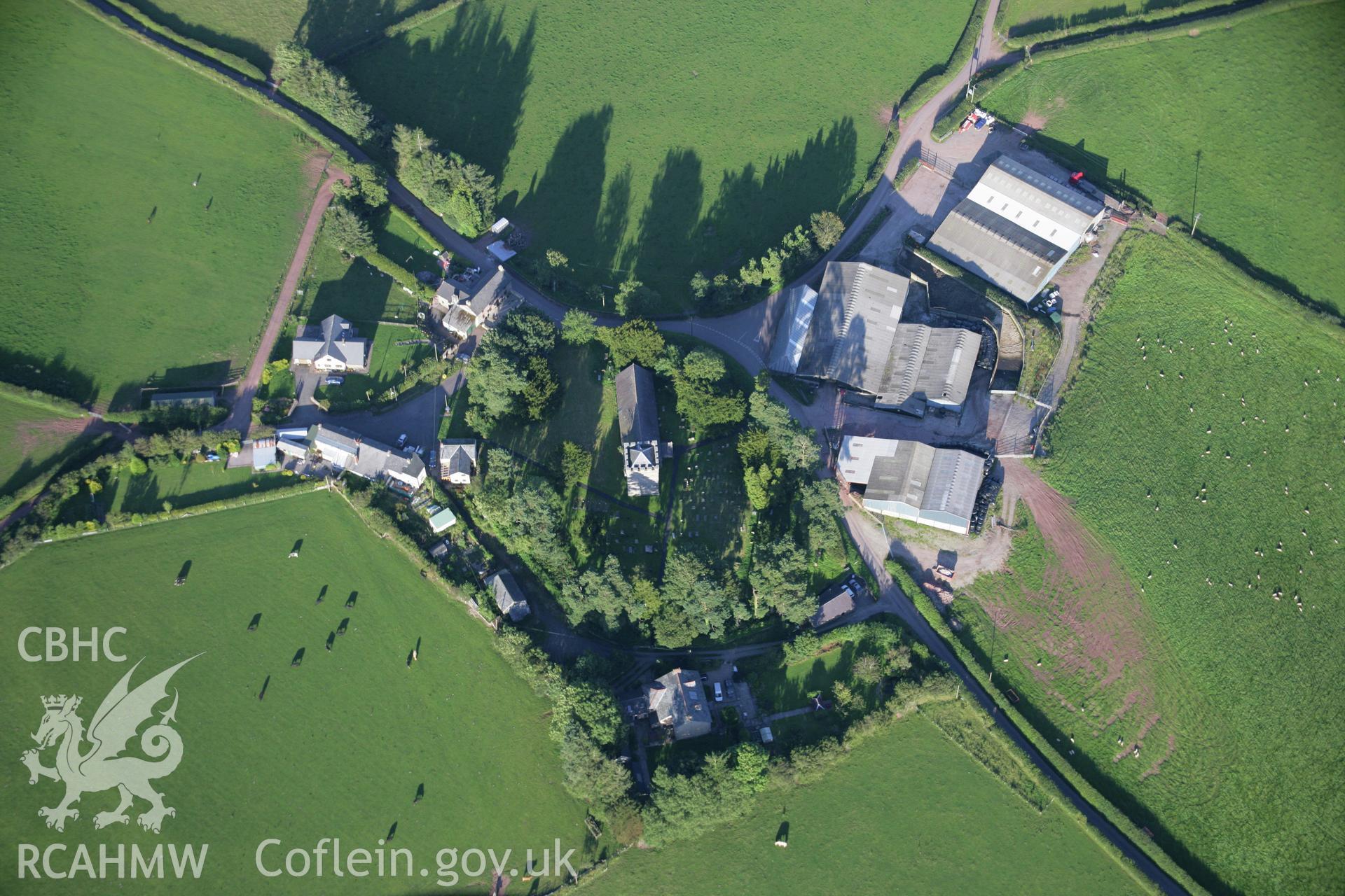 RCAHMW colour oblique aerial photograph of Merthyr Cynog village. Taken on 08 August 2007 by Toby Driver