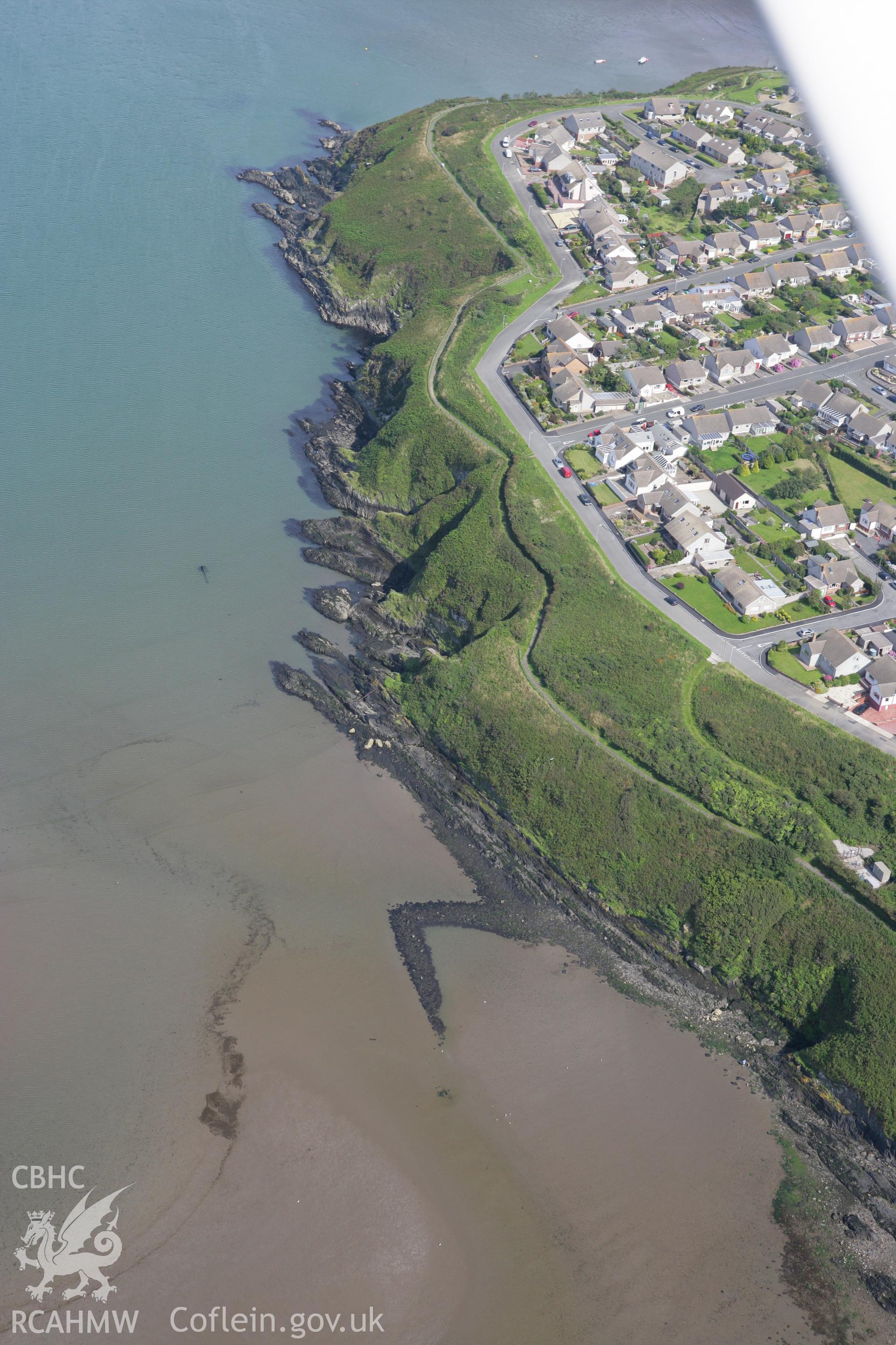 RCAHMW colour oblique photograph of Fishguard harbour south-east fishtrap. Taken by Toby Driver on 01/08/2007.