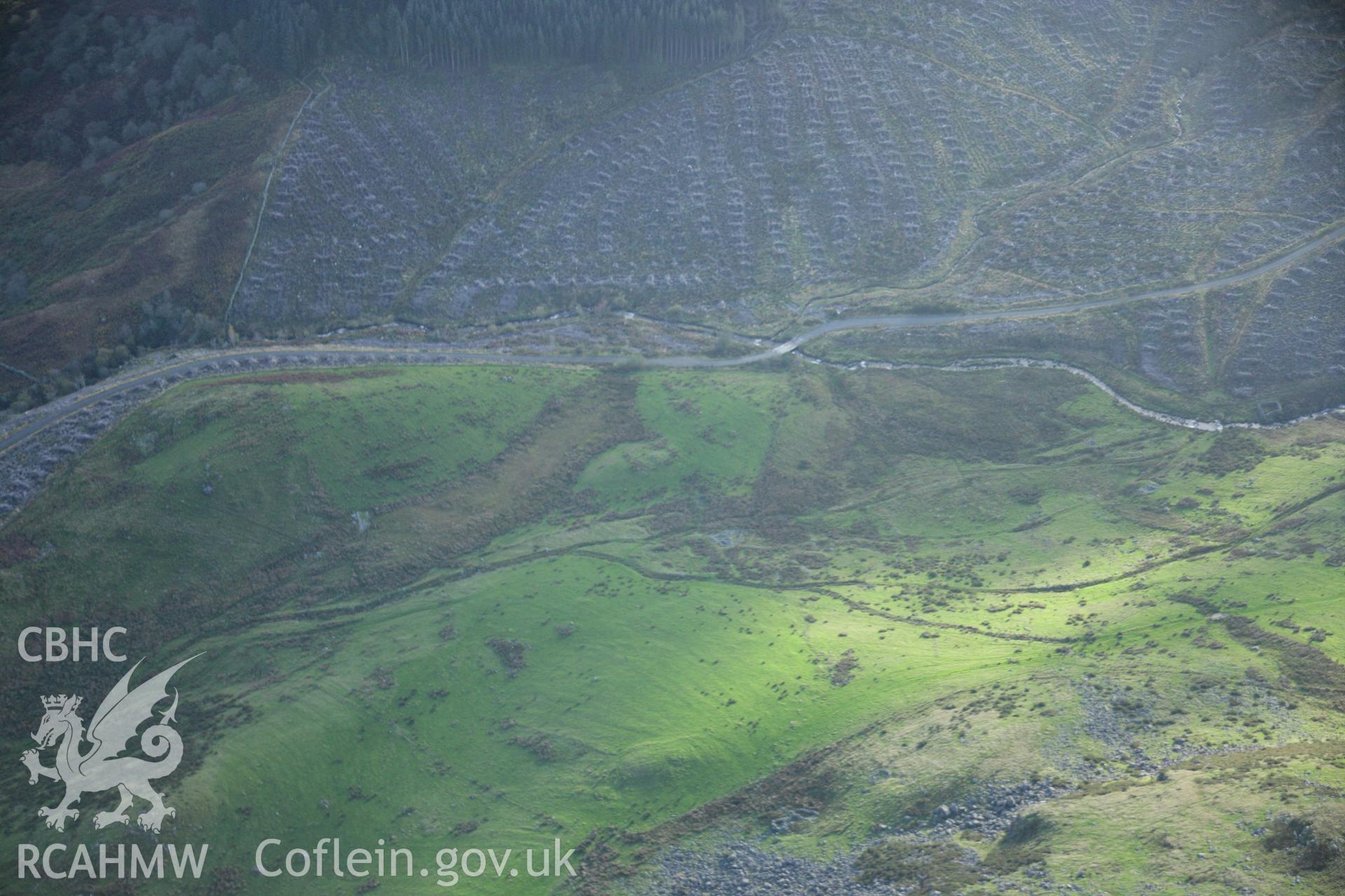 RCAHMW colour oblique photograph of Moel Caws hut group. Taken by Toby Driver on 30/10/2007.