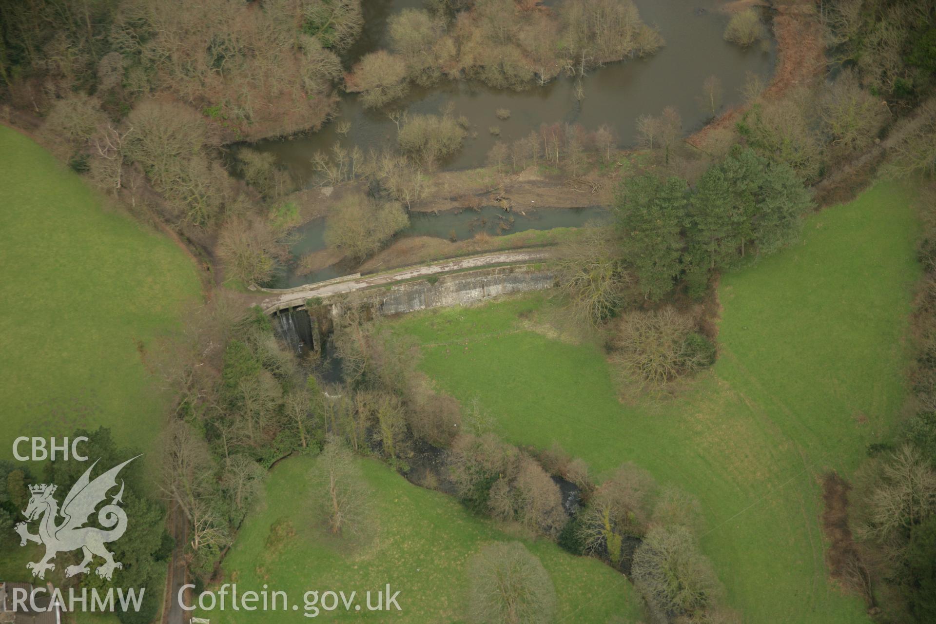 RCAHMW colour oblique aerial photograph of Afon Clydach Dam at Neath Abbey Ironworks. Taken on 16 March 2007 by Toby Driver