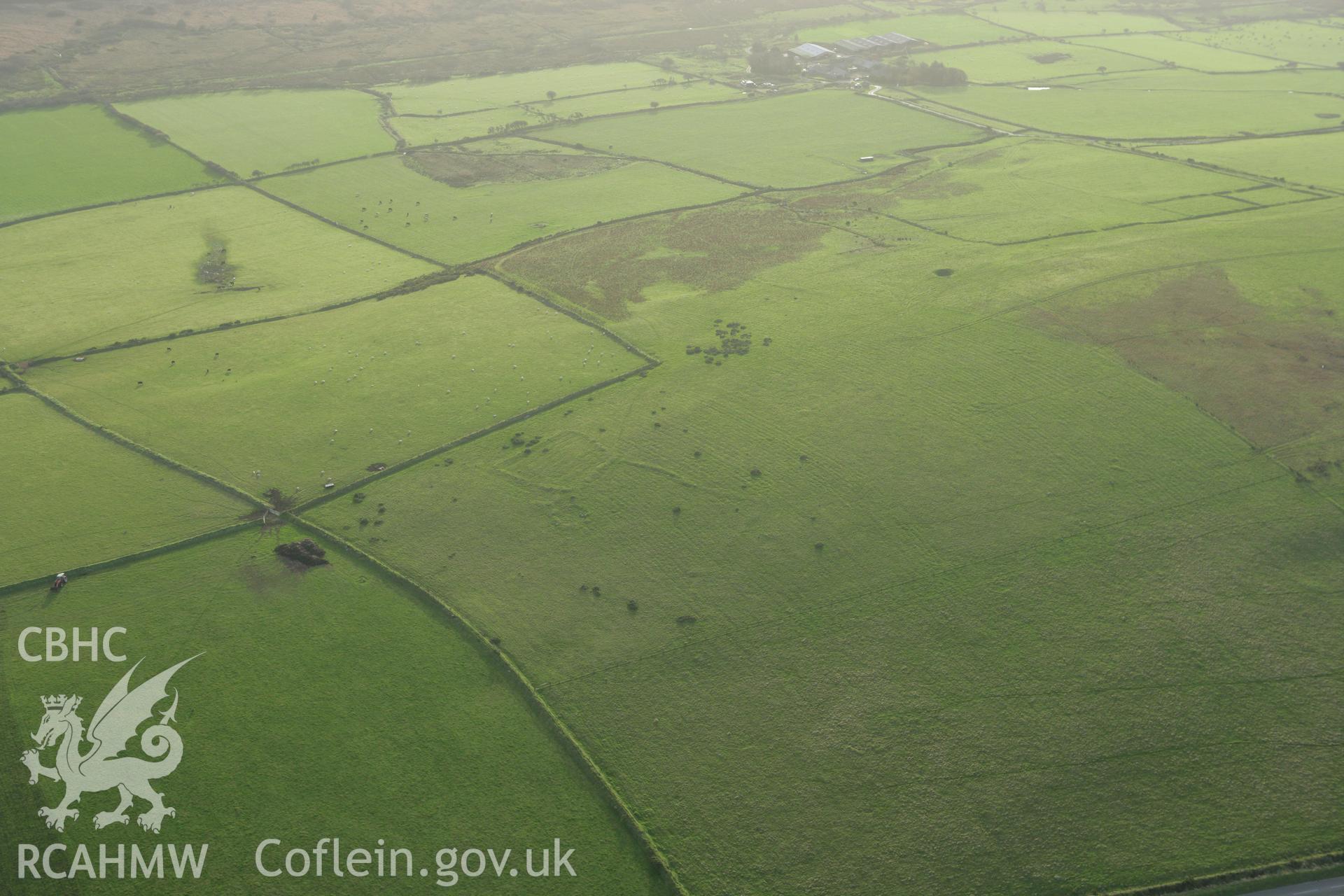 RCAHMW colour oblique photograph of Mynydd Morvil settlement, enclosures. Taken by Toby Driver on 06/11/2007.