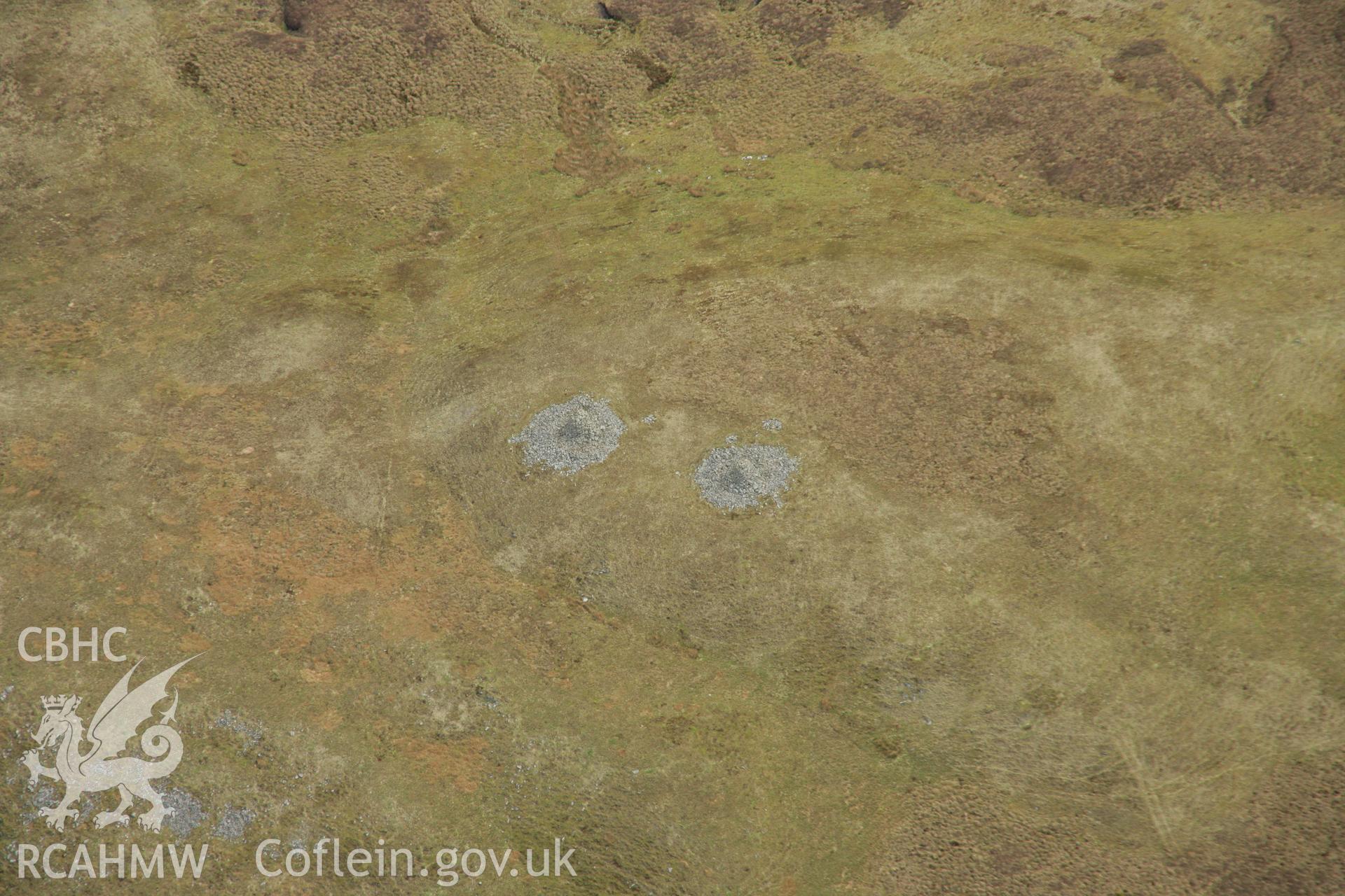 RCAHMW colour oblique aerial photograph of Carn Gwilym Cairns, Carn Hyddgen. Taken on 17 April 2007 by Toby Driver