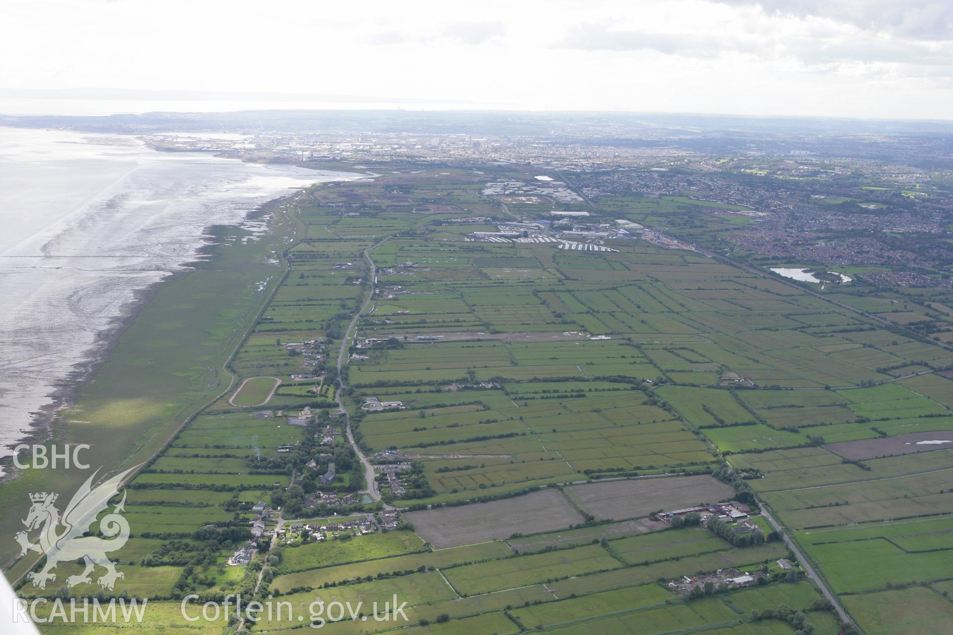 RCAHMW colour oblique aerial photograph of Peterstone Wentlooge, Peterstone Gout showing landscape at low tide. Taken on 30 July 2007 by Toby Driver