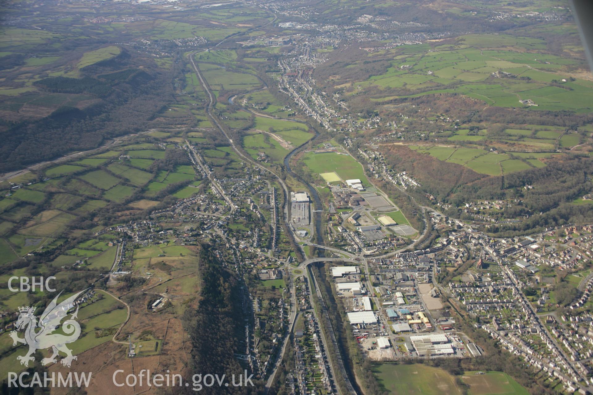 RCAHMW colour oblique aerial photograph of Pontardawe Town Curved Pound, Swansea Canal, in landscape view looking south-west. Taken on 21 March 2007 by Toby Driver