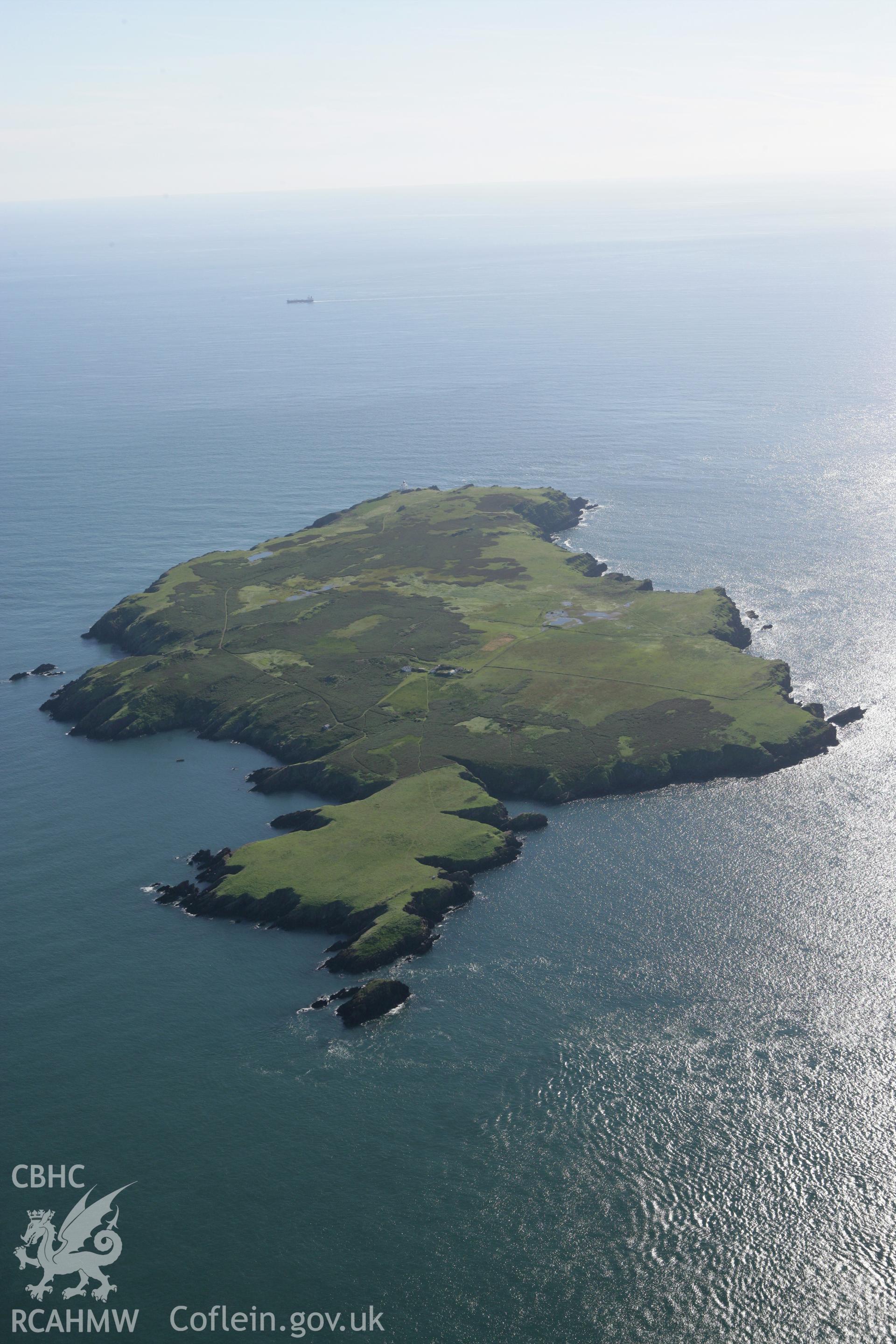 RCAHMW colour oblique aerial photograph of Skokholm Island. Taken on 30 July 2007 by Toby Driver