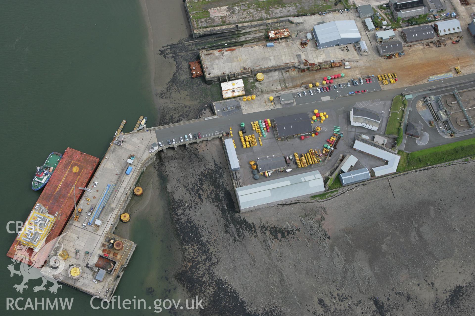 RCAHMW colour oblique photograph of Pembroke Dockyard, Dry Dock. Taken by Toby Driver on 01/08/2007.