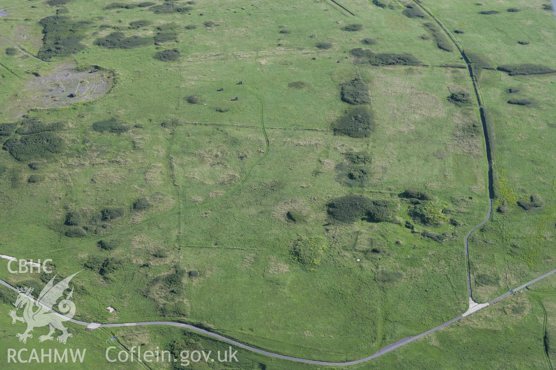 RCAHMW colour oblique aerial photograph of Linney Deserted Medieval Village. Taken on 30 July 2007 by Toby Driver