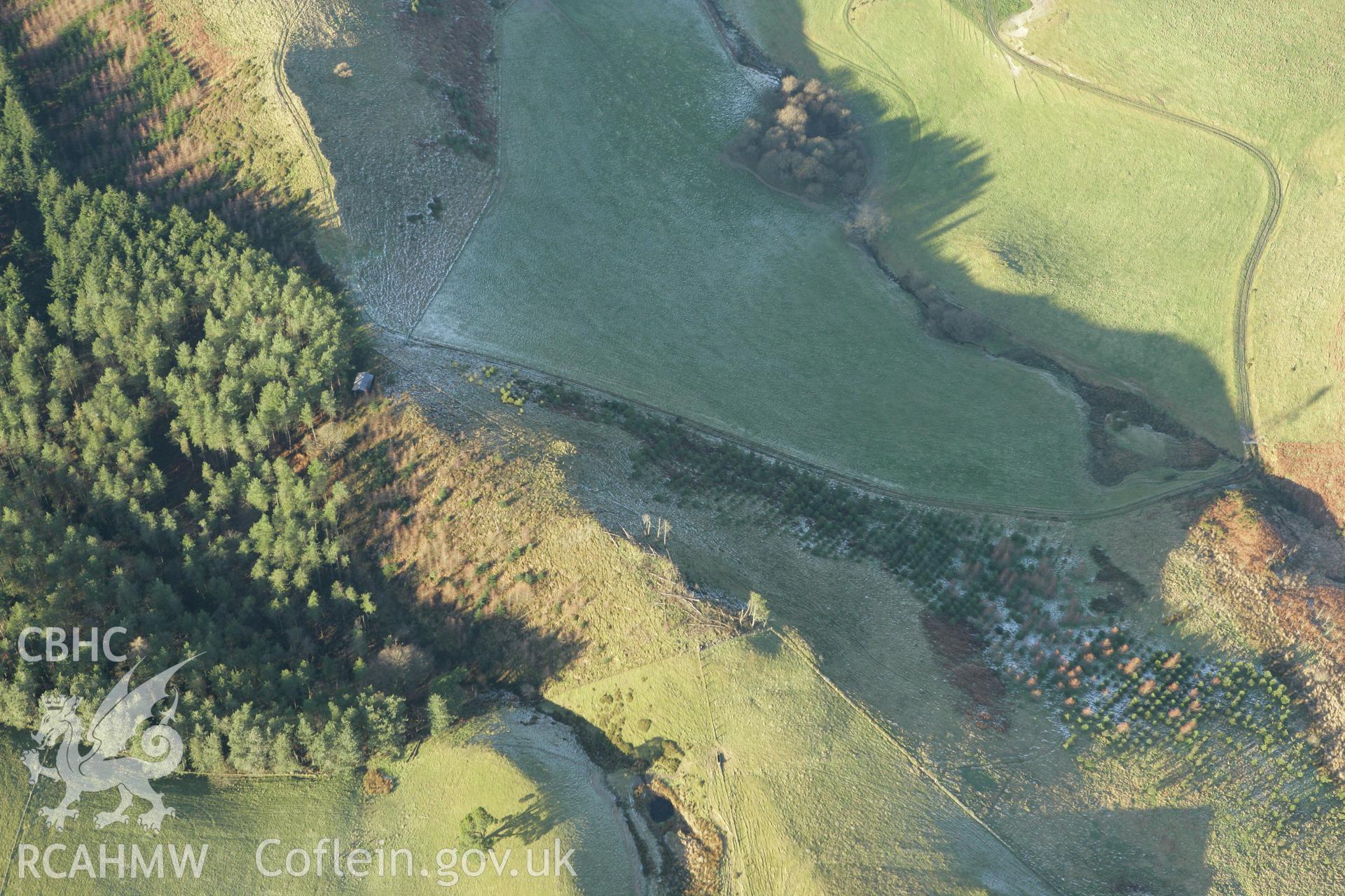 RCAHMW colour oblique photograph of Coed Tyn y Cwm, showing the east fort. Taken by Toby Driver on 20/12/2007.