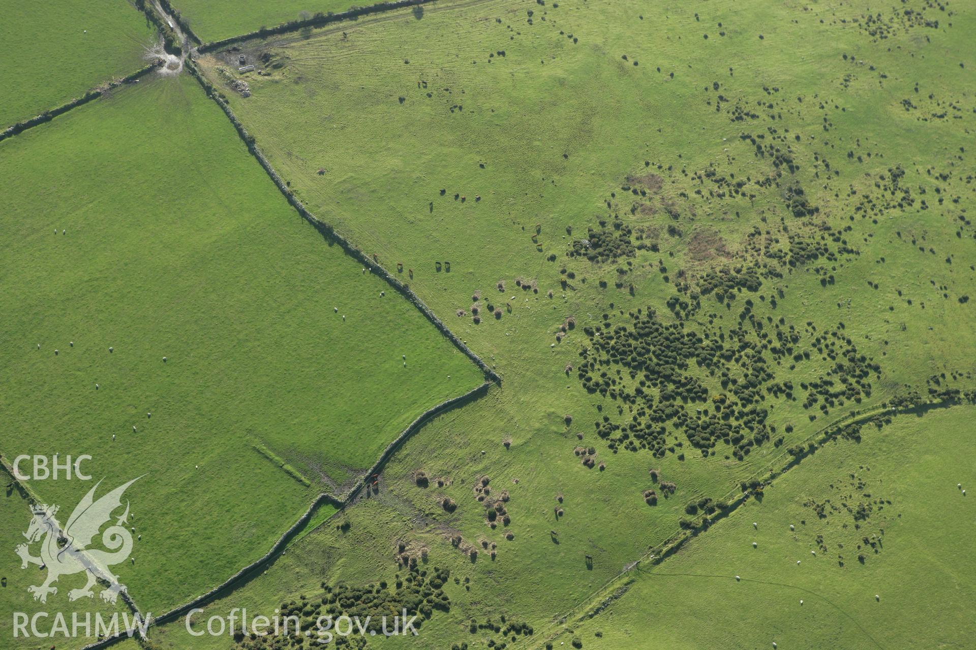 RCAHMW colour oblique photograph of Caer Meini Isaf, deserted rural settlement earthworks. Taken by Toby Driver on 29/11/2007.