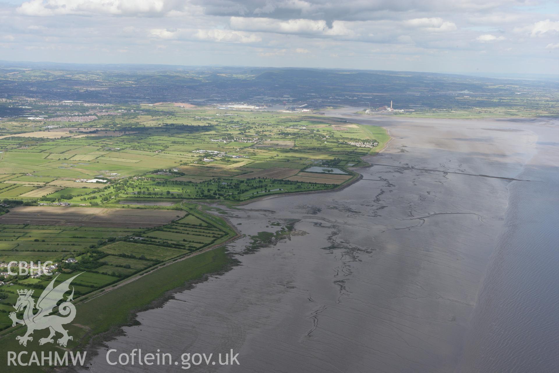 RCAHMW colour oblique aerial photograph of Peterstone Wentlooge, Peterstone Gout showing landscape at low tide. Taken on 30 July 2007 by Toby Driver