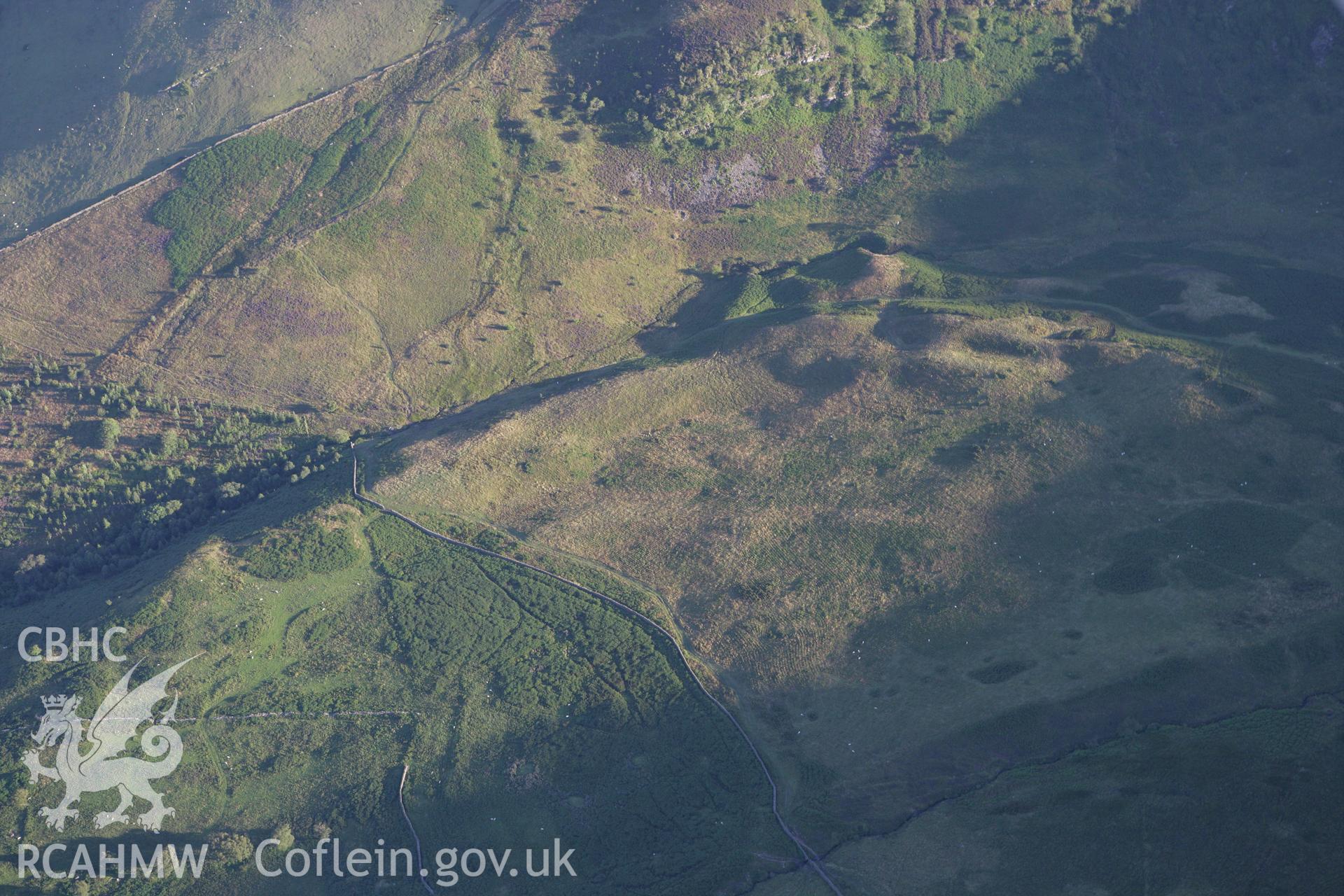 RCAHMW colour oblique aerial photograph of Craig Cerrig-Gleisiad Settlement. Taken on 08 August 2007 by Toby Driver