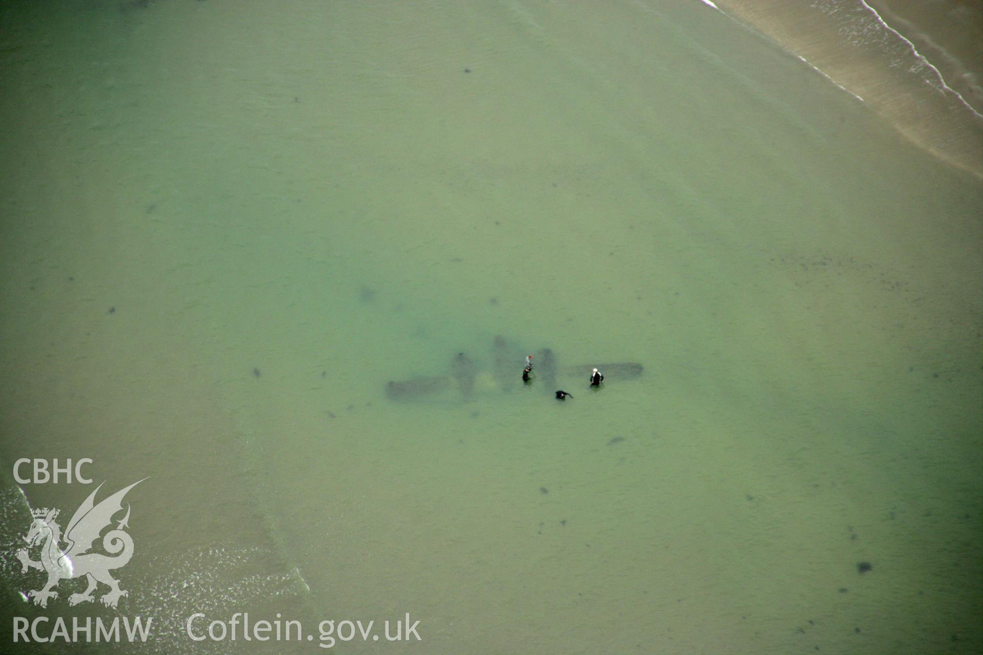 RCAHMW colour oblique photograph of P-38 Lightning, aircraft wreck at low tide. Taken by Toby Driver on 08/10/2007.