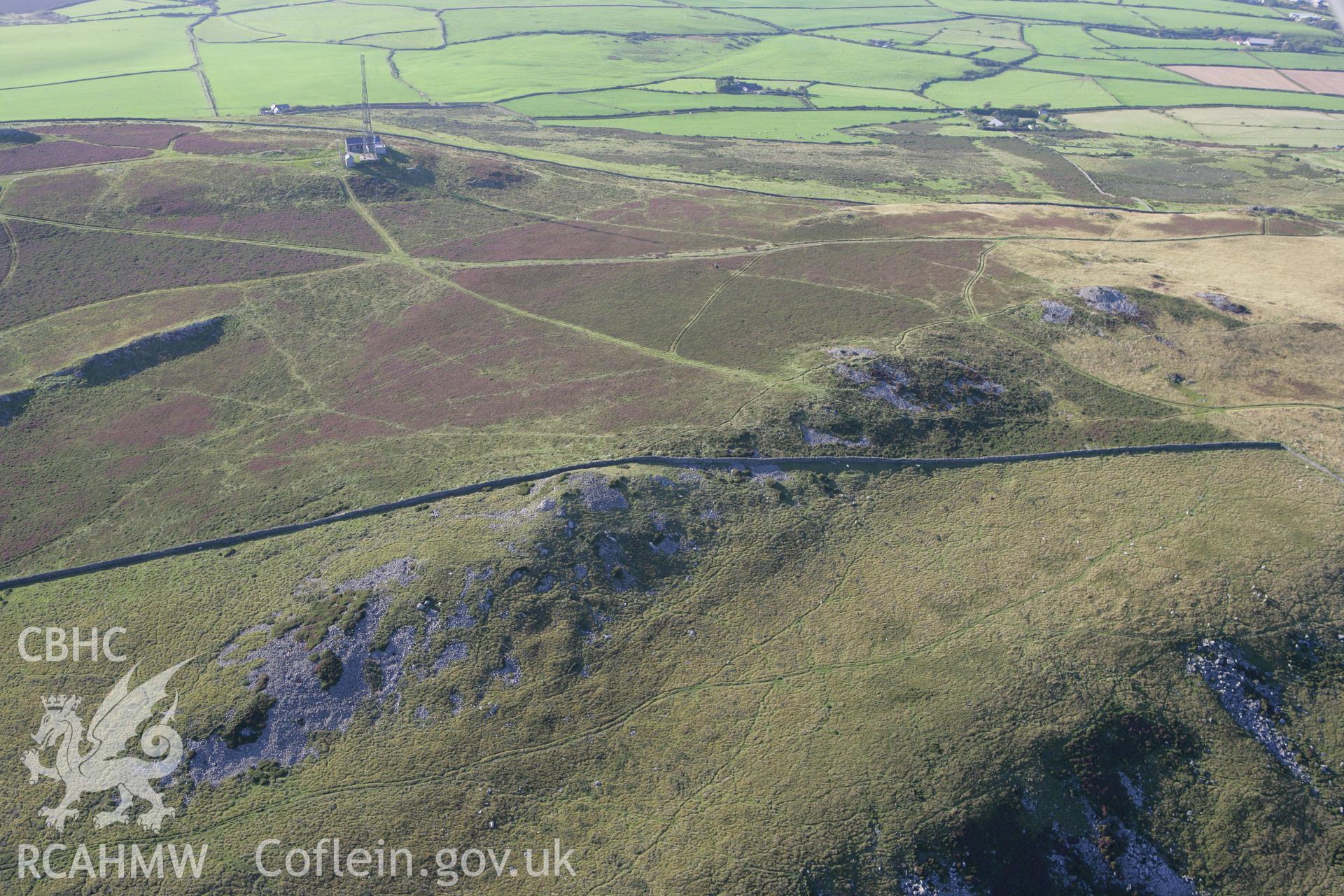 RCAHMW colour oblique aerial photograph of Mynydd Rhiw Cairn I. Taken on 06 September 2007 by Toby Driver