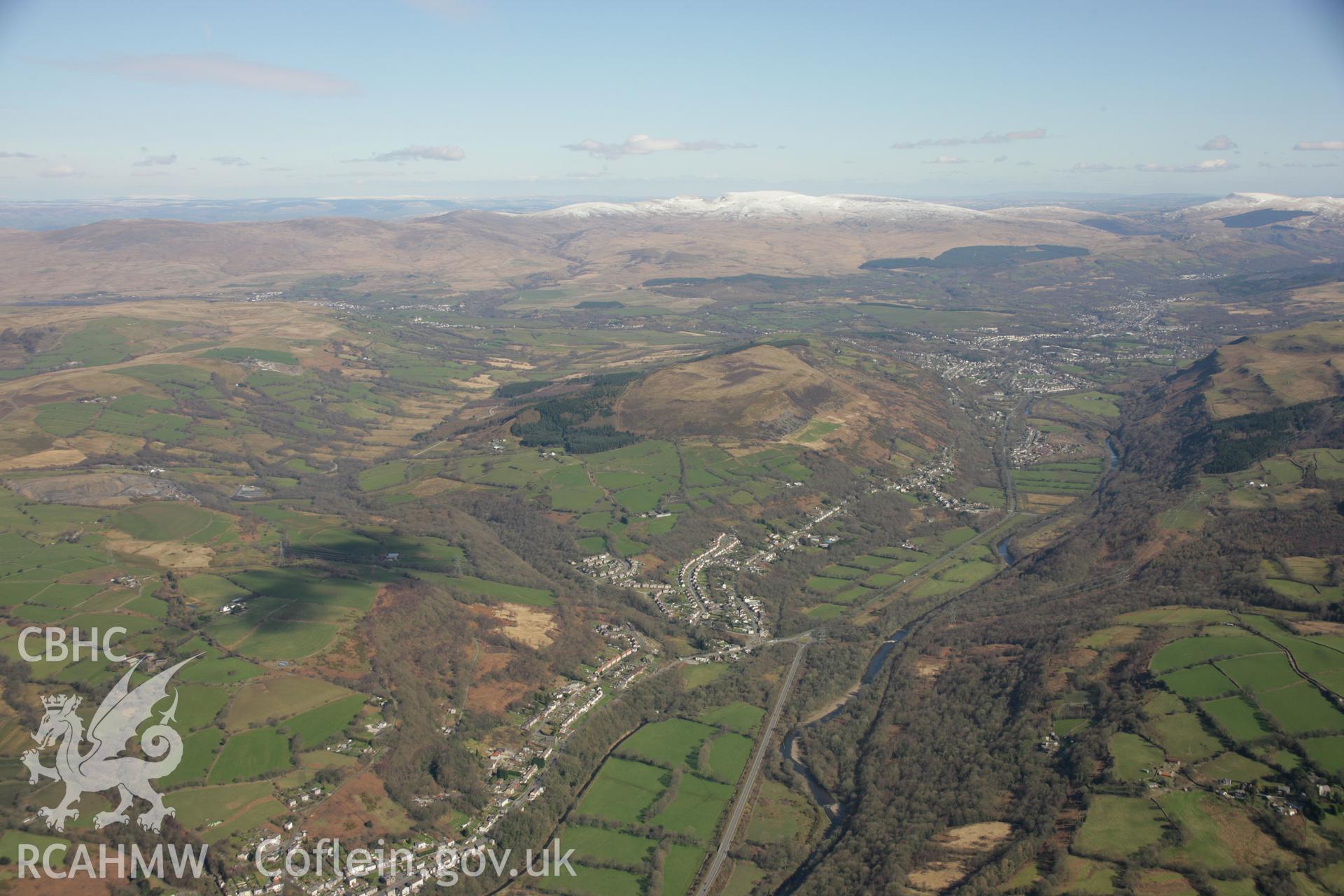 RCAHMW colour oblique aerial photograph of Bryn Tinplate Works in landscape view of Ynysmeudwy looking towards the north-east. Taken on 21 March 2007 by Toby Driver