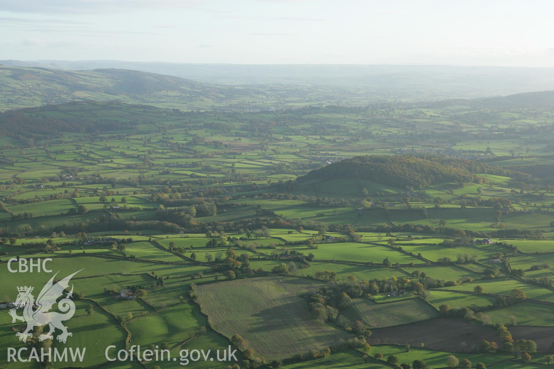 RCAHMW colour oblique photograph of Gaer Fawr hillfort, Guilsfield. Taken by Toby Driver on 30/10/2007.