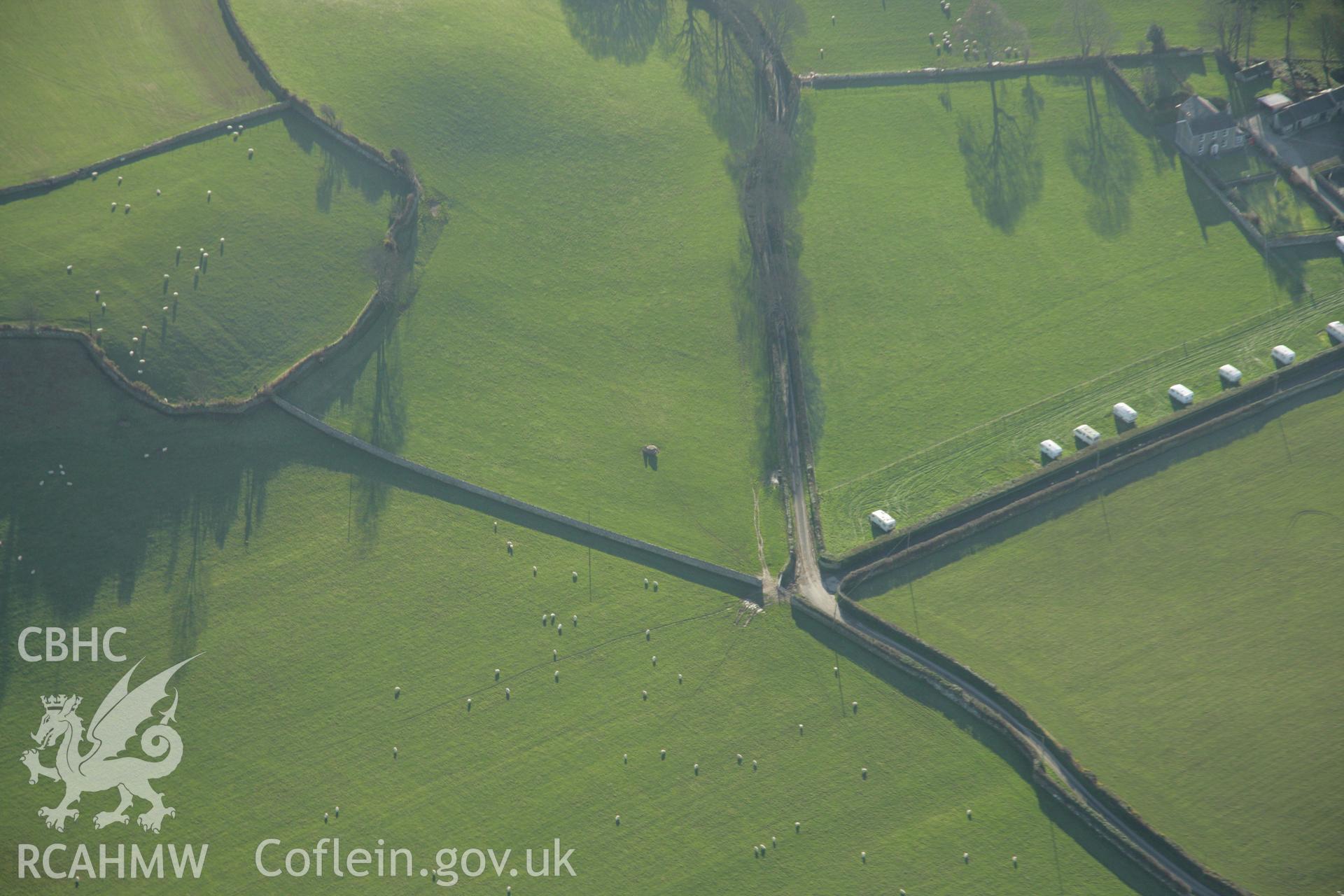 RCAHMW colour oblique aerial photograph showing view of Penarth Burial Chamber. Taken on 25 January 2007 by Toby Driver