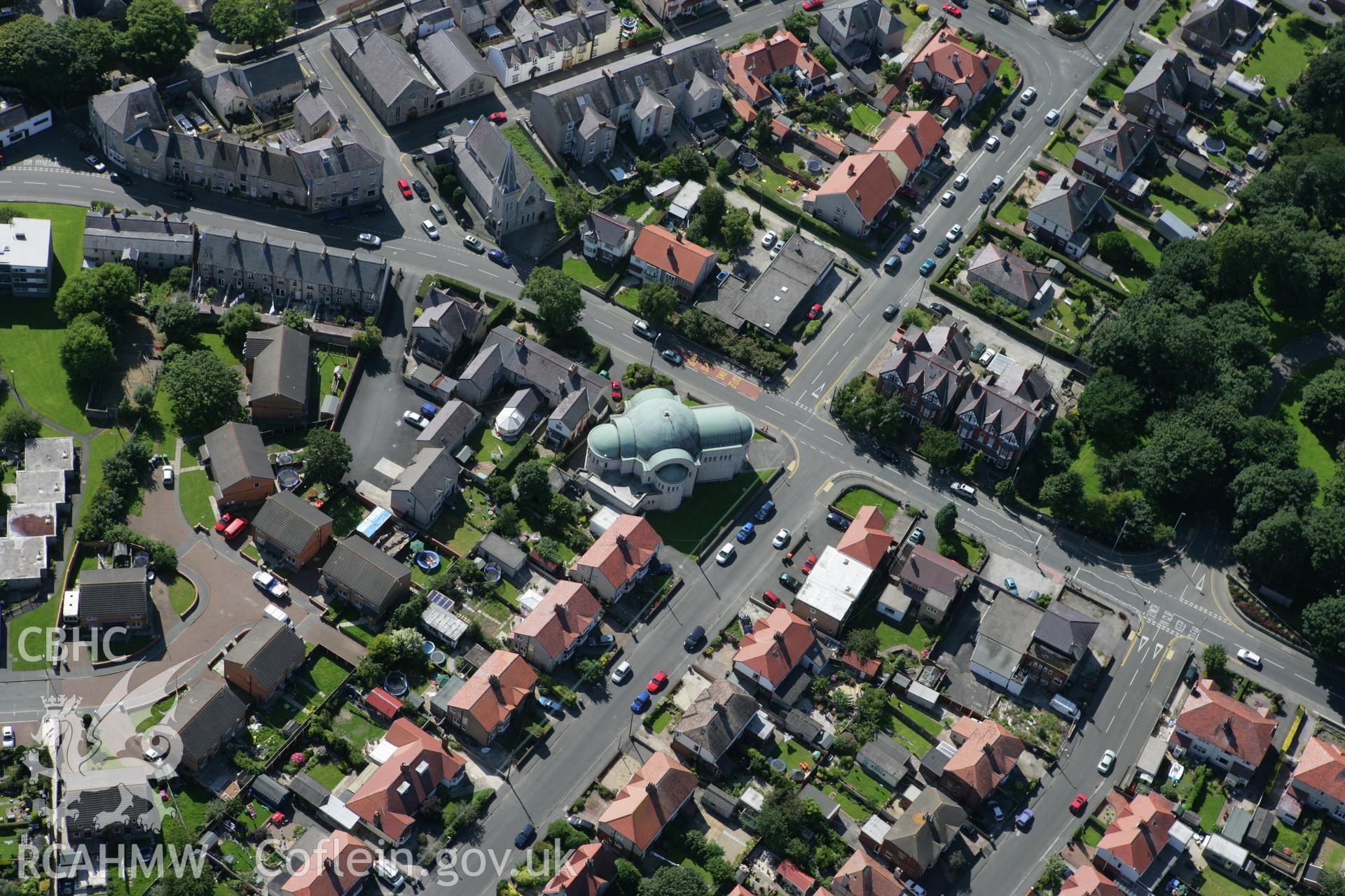 RCAHMW colour oblique aerial photograph of Abergele with the Catholic church visible. Taken on 31 July 2007 by Toby Driver