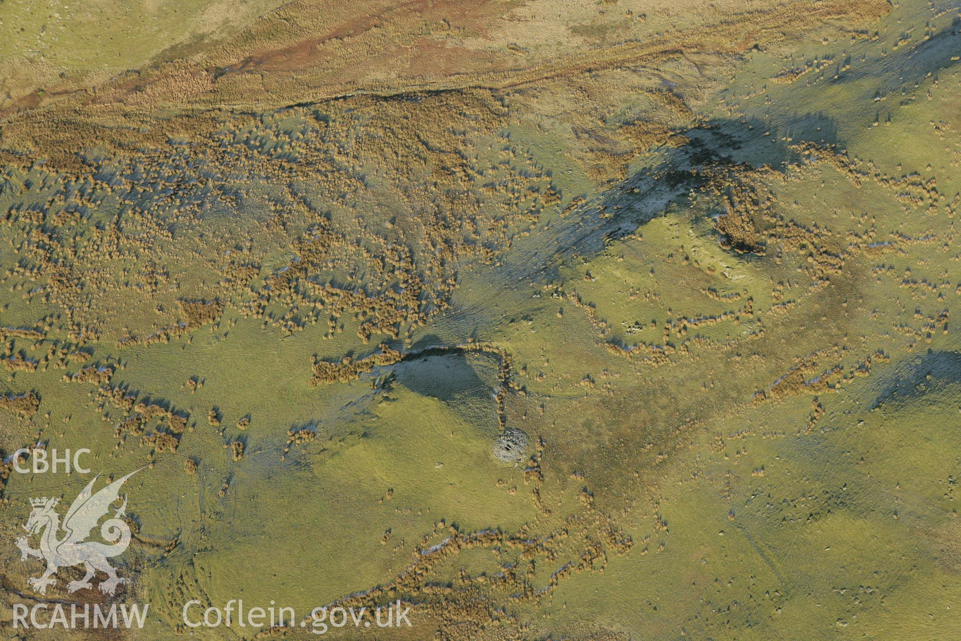 RCAHMW colour oblique photograph of Blaen Glasffrwd cairn III. Taken by Toby Driver on 20/12/2007.