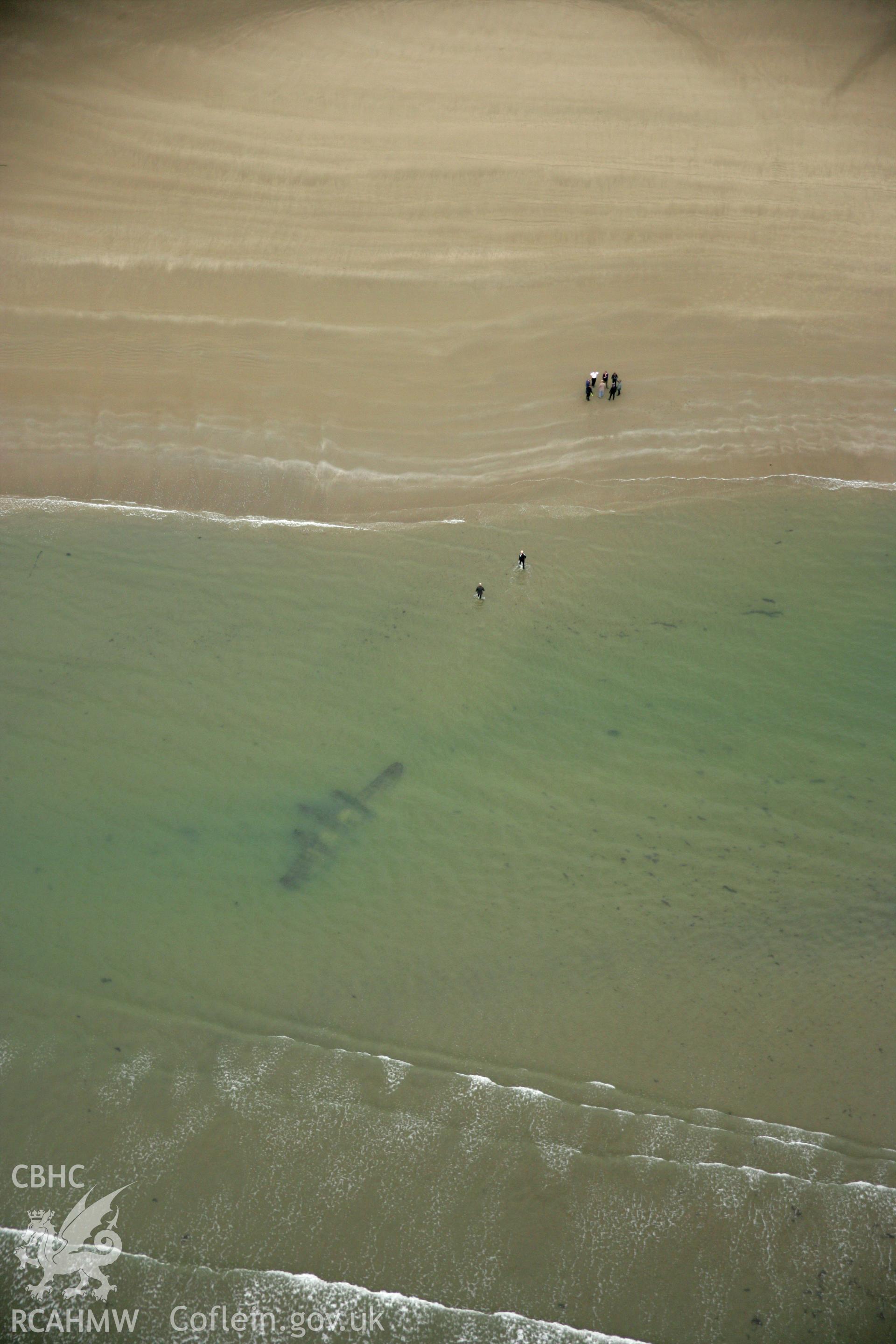 RCAHMW colour oblique photograph of P-38 Lightning, aircraft wreck at low tide. Taken by Toby Driver on 08/10/2007.