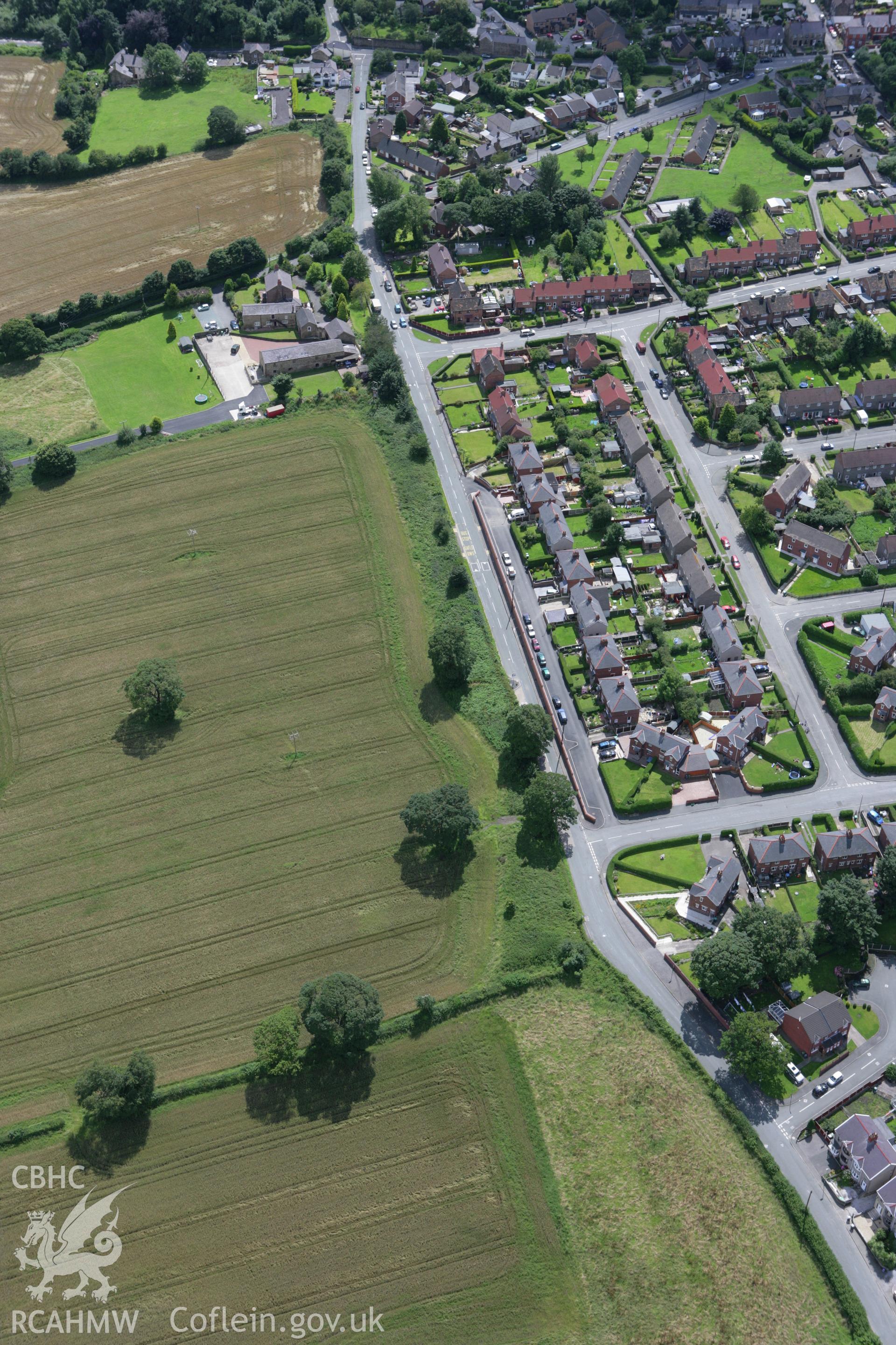 RCAHMW colour oblique aerial photograph of the northern section of Offa's Dyke at Coedpoeth. Taken on 24 July 2007 by Toby Driver