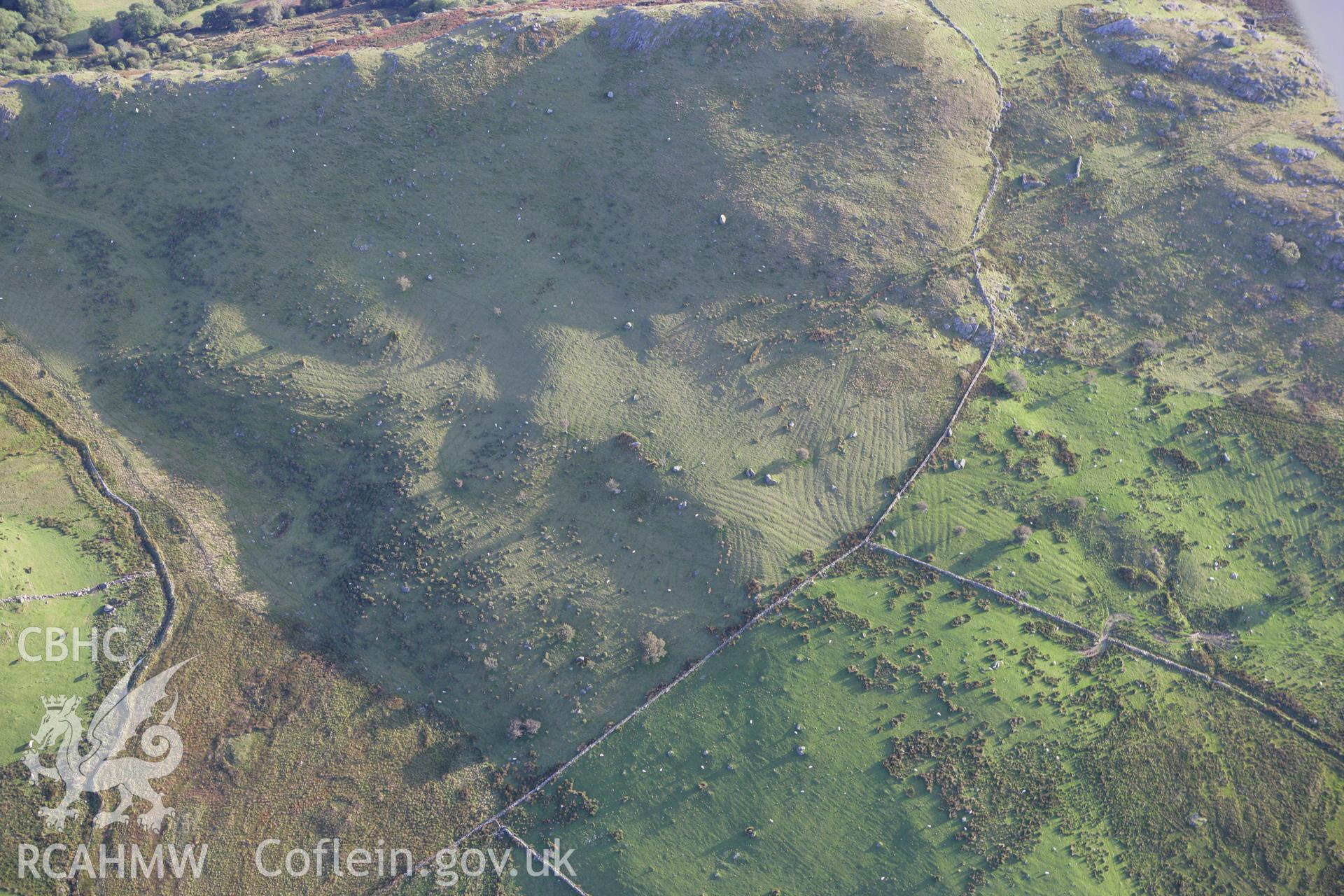 RCAHMW colour oblique aerial photograph of the remains of a settlement and traces of cultivation at Craig-y-Gesail. Taken on 06 September 2007 by Toby Driver