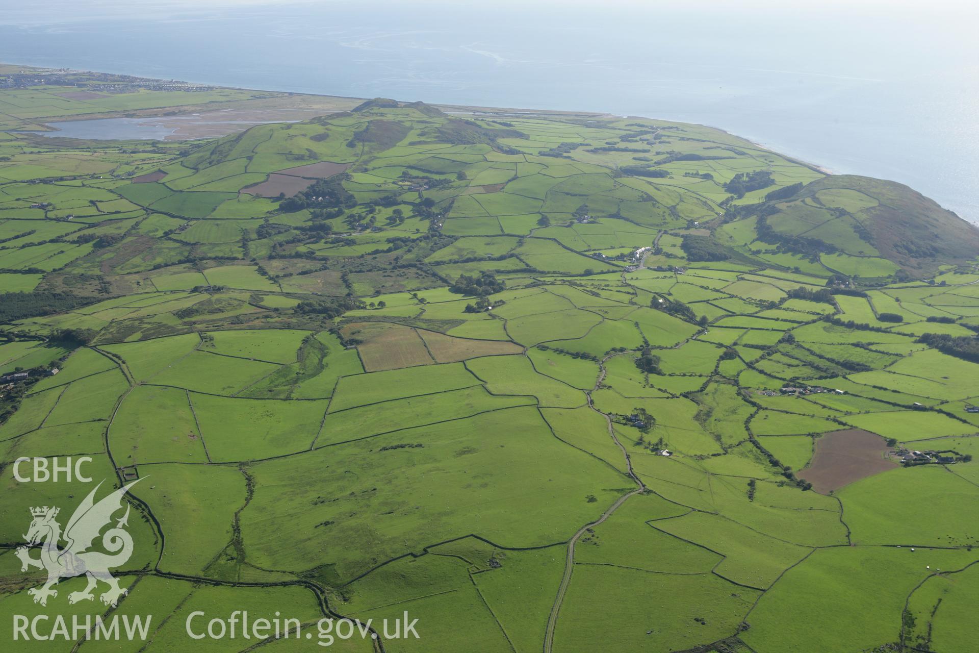 RCAHMW colour oblique aerial photograph of Tal-y-Gareg Hillfort and the surrounding landscape. Taken on 06 September 2007 by Toby Driver