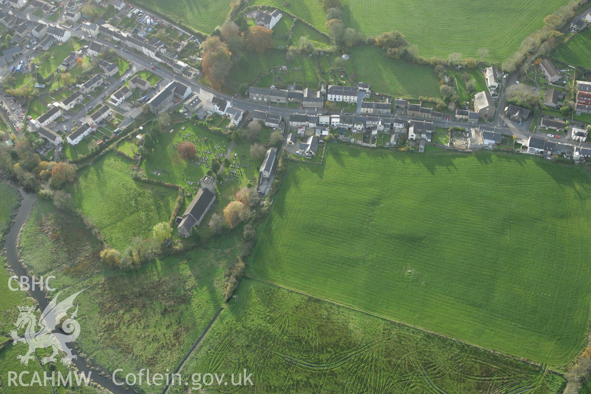 RCAHMW colour oblique photograph of Claustral buildings, St Clears priory (cluniac);St Mary and Magdalene's church, St Clears;Earthworks of deserted settlement, St Clears. Taken by Toby Driver on 06/11/2007.