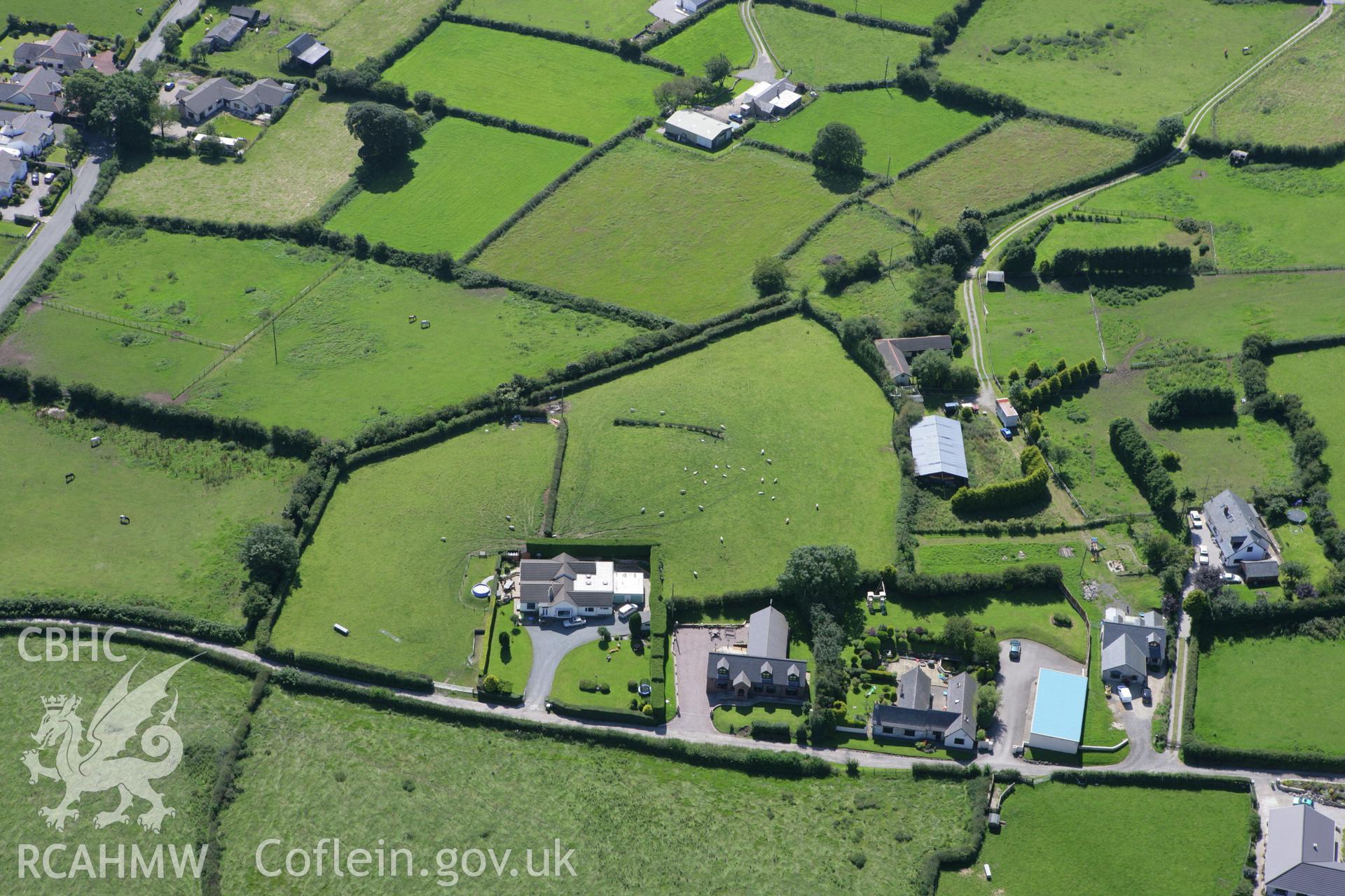 RCAHMW colour oblique aerial photograph of Pen-y-Gorseddau Mound (Axton 'A'). Taken on 31 July 2007 by Toby Driver