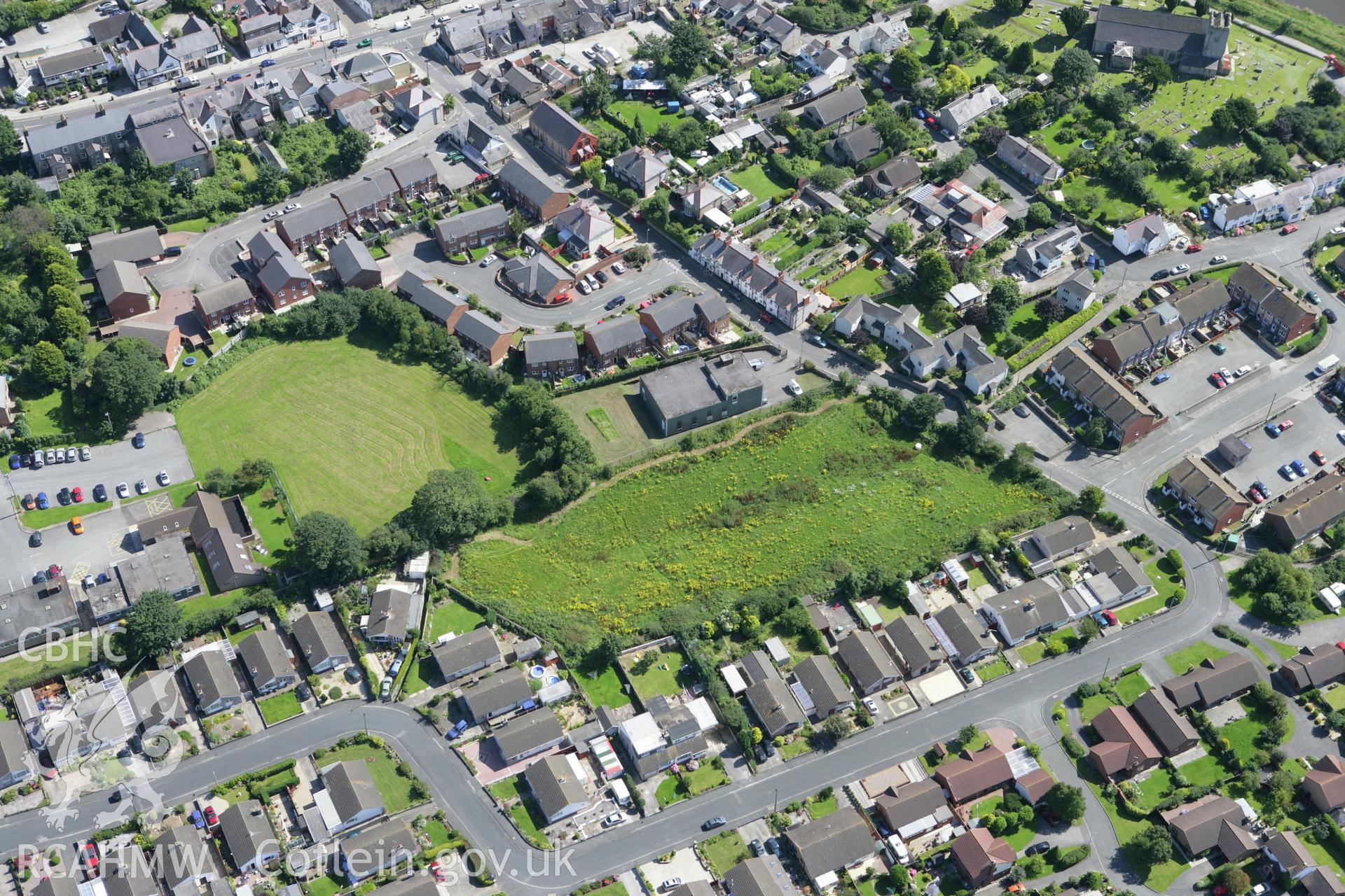 RCAHMW colour oblique aerial photograph of the Edwardian town defences, Rhuddlan. Taken on 31 July 2007 by Toby Driver