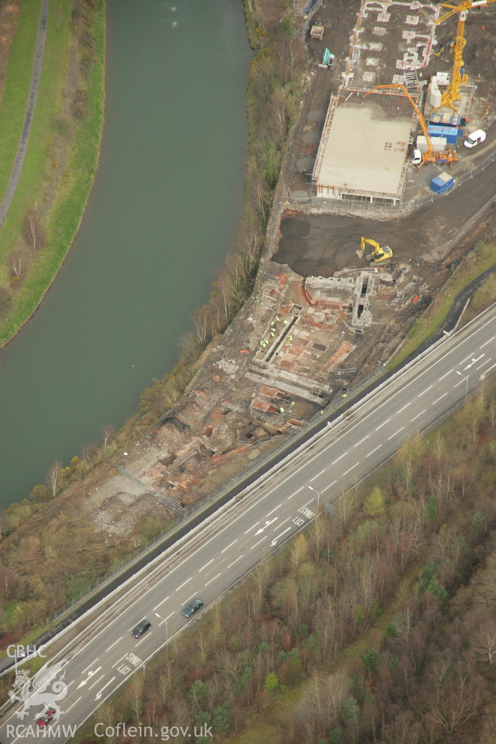 RCAHMW colour oblique aerial photograph of Upper Bank Copperworks, Swansea, showing excavations. Taken on 16 March 2007 by Toby Driver