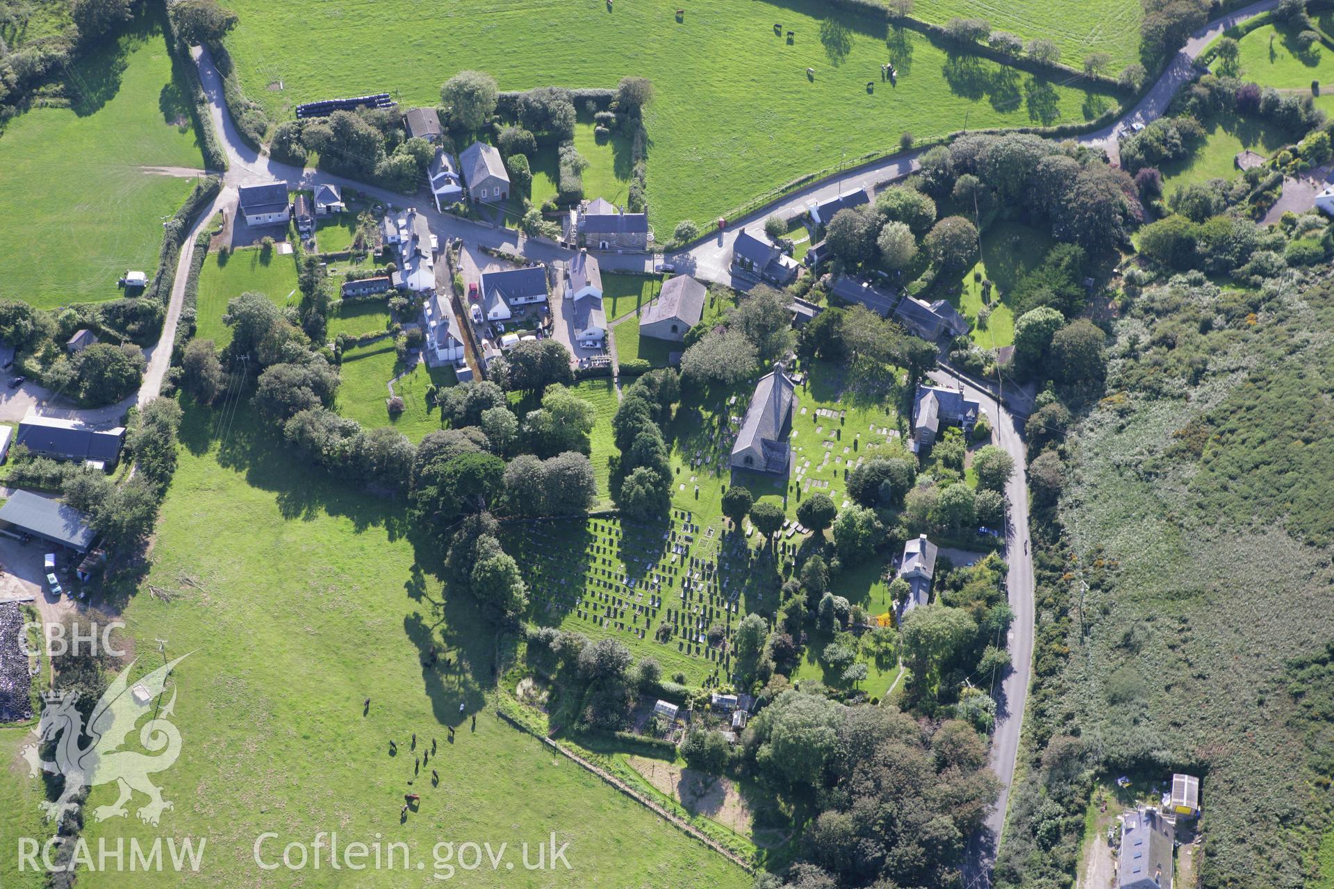 RCAHMW colour oblique aerial photograph of St Cian's Church, Llangian. Taken on 06 September 2007 by Toby Driver