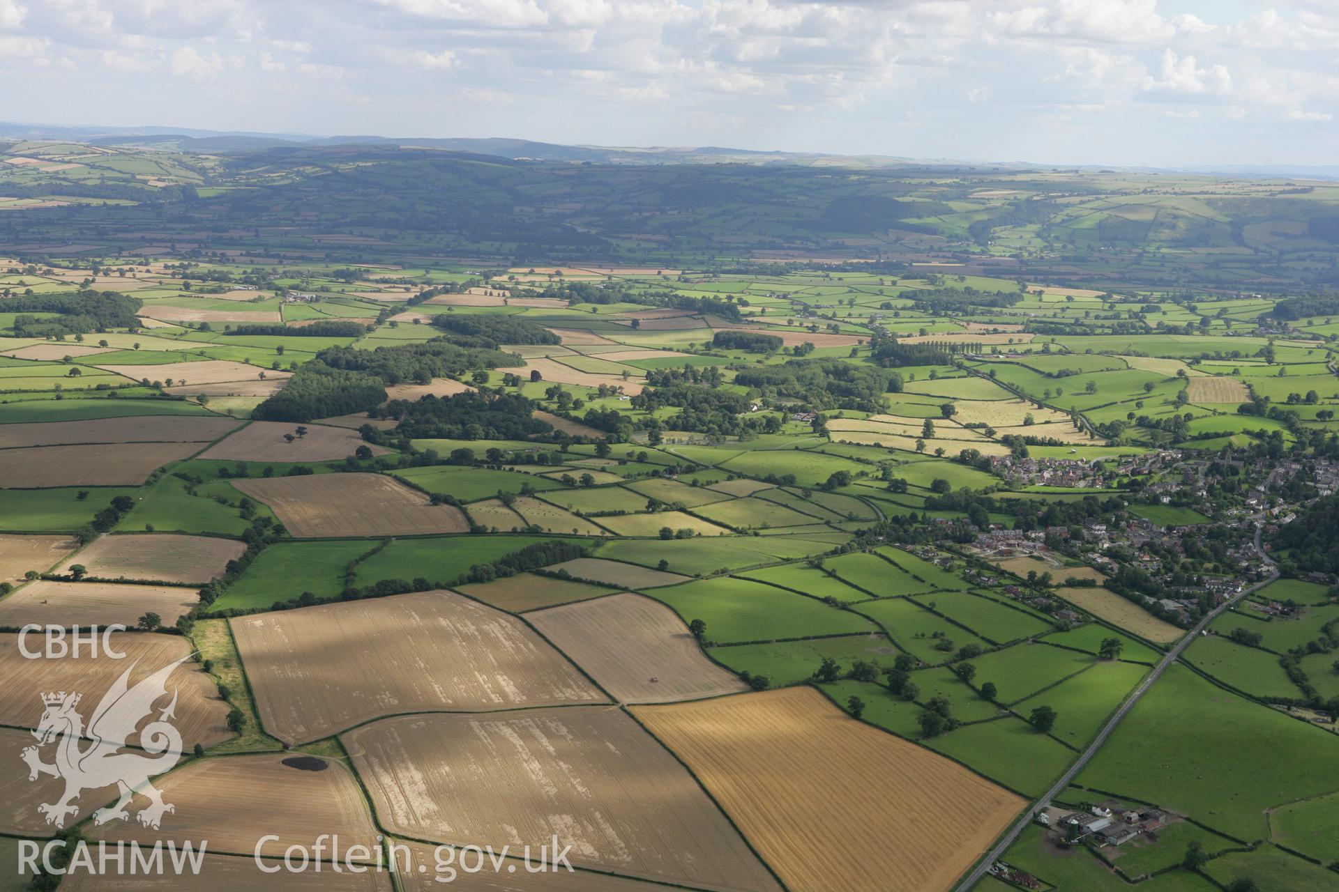 RCAHMW colour oblique aerial photograph of a section of Offa's Dyke near Montgomery. Taken on 08 August 2007 by Toby Driver