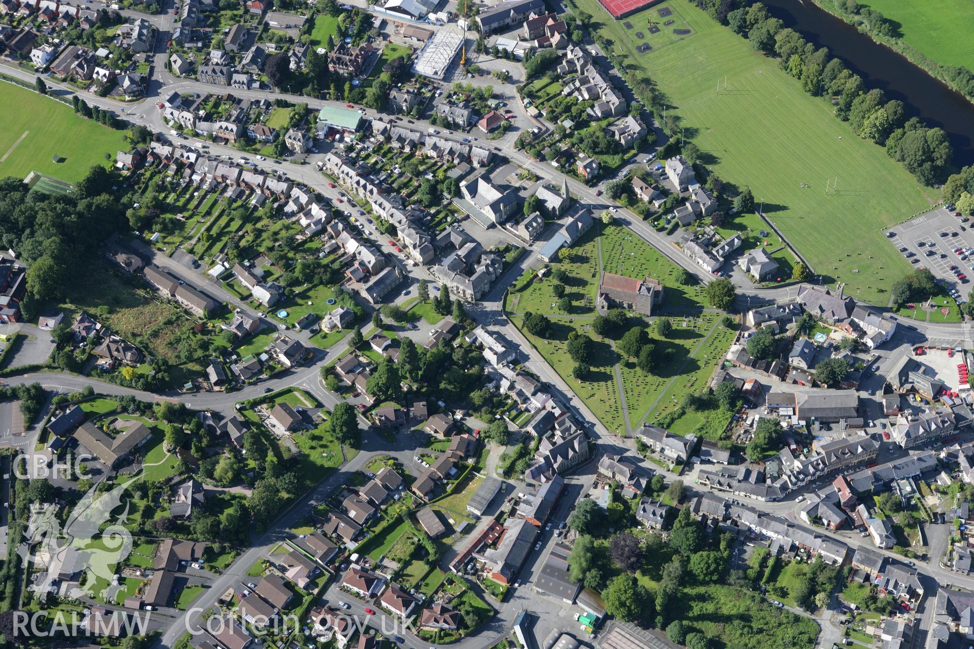 RCAHMW colour oblique aerial photograph of St Marys Parish Church, Builth Wells,  viewed from the north-east. Taken on 08 August 2007 by Toby Driver