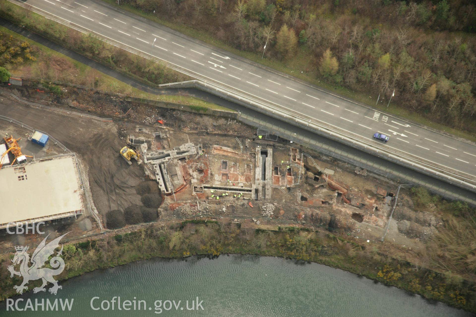 RCAHMW colour oblique aerial photograph of Upper Bank Copperworks, Swansea, showing excavations. Taken on 16 March 2007 by Toby Driver