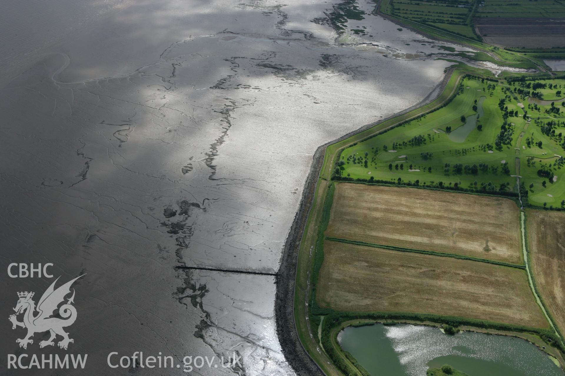 RCAHMW colour oblique aerial photograph of Peterstone Wentlooge, Peterstone Gout showing landscape at low tide, viewed from the east. Taken on 30 July 2007 by Toby Driver