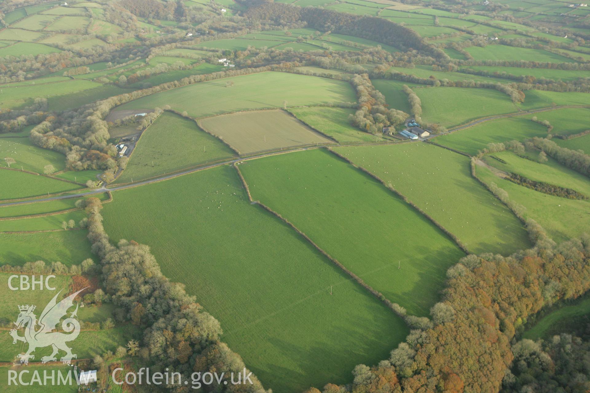 RCAHMW colour oblique photograph of Brechfa;concentric cropmark enclosure North-West of. Taken by Toby Driver on 06/11/2007.